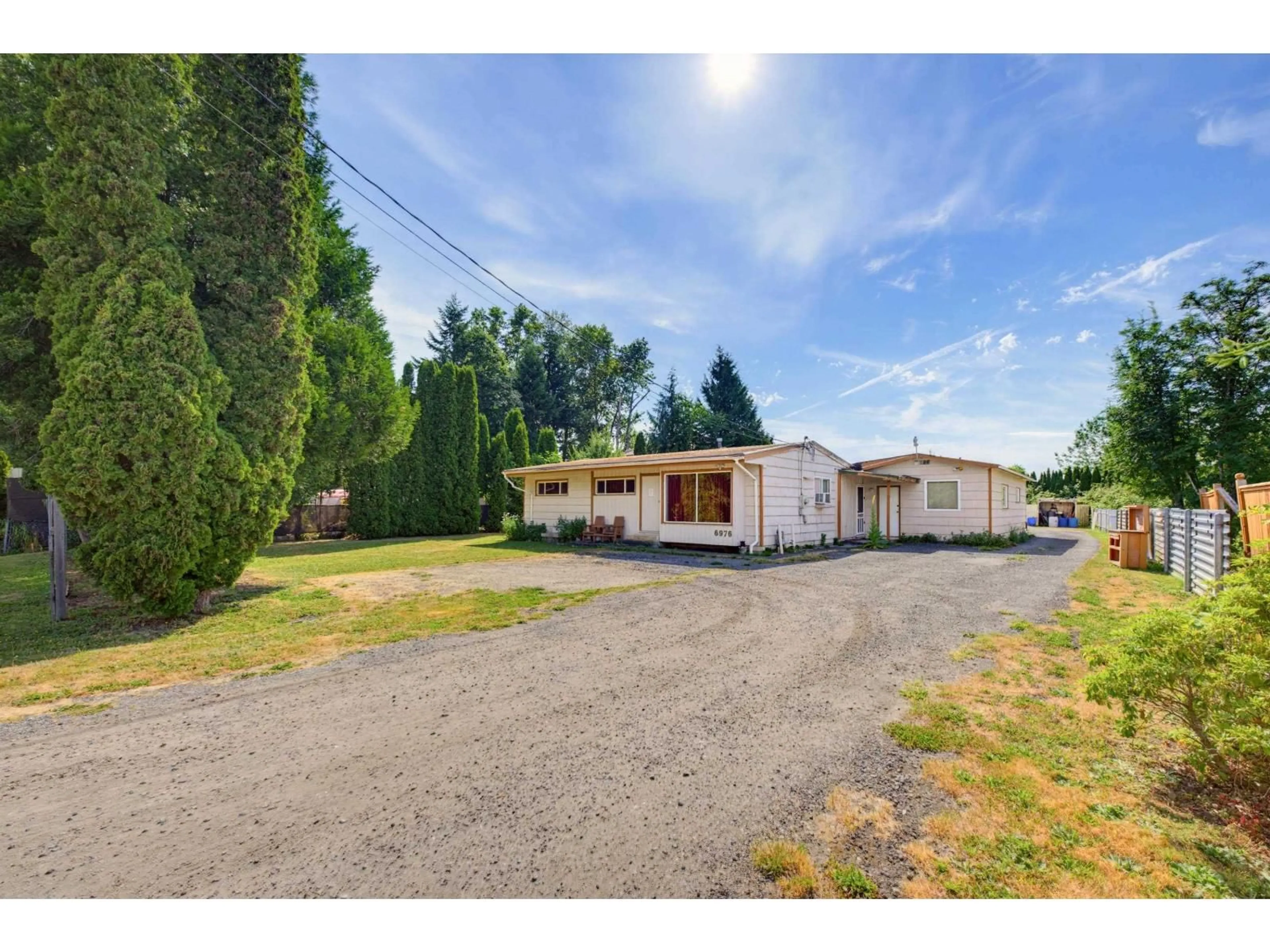 A pic from outside/outdoor area/front of a property/back of a property/a pic from drone, unknown for 6976 GLOVER ROAD, Langley British Columbia V2Y1X9