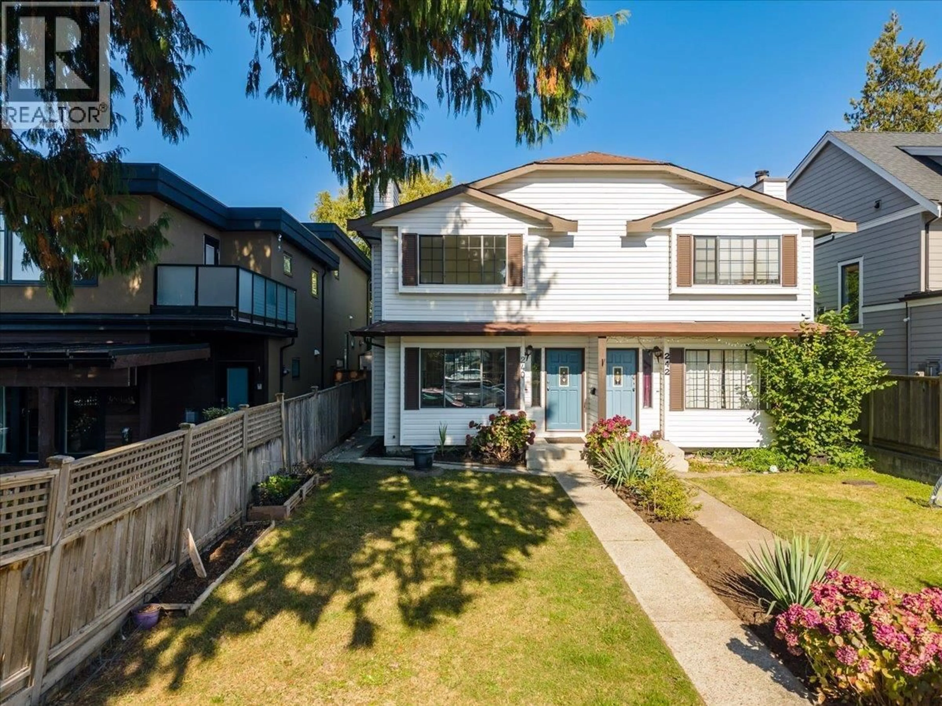 A pic from outside/outdoor area/front of a property/back of a property/a pic from drone, street for 240 18TH STREET, North Vancouver British Columbia V7L2X6