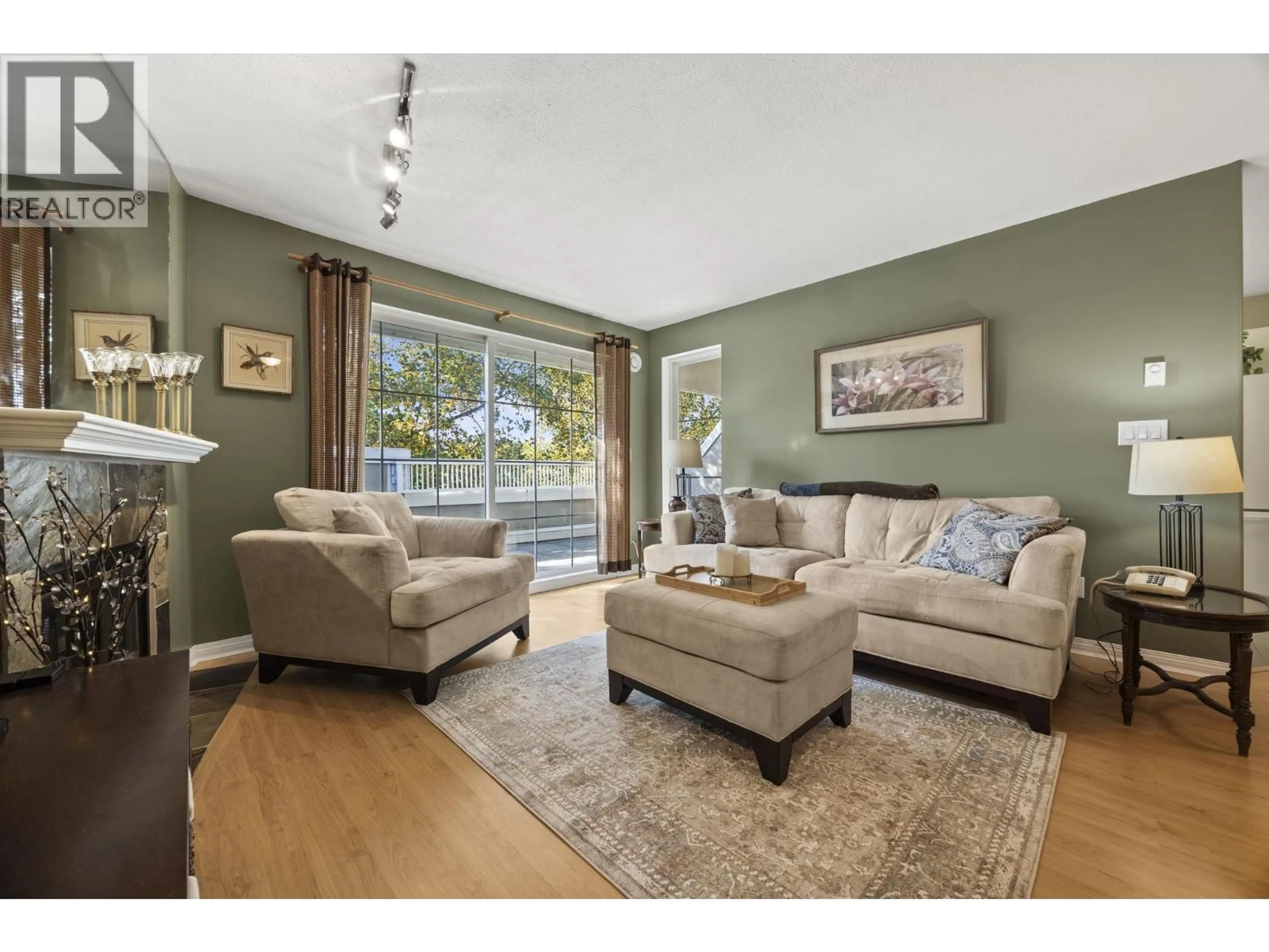 Living room with furniture, unknown for 404 - 2388 WELCHER AVENUE, Port Coquitlam British Columbia V3C1X5
