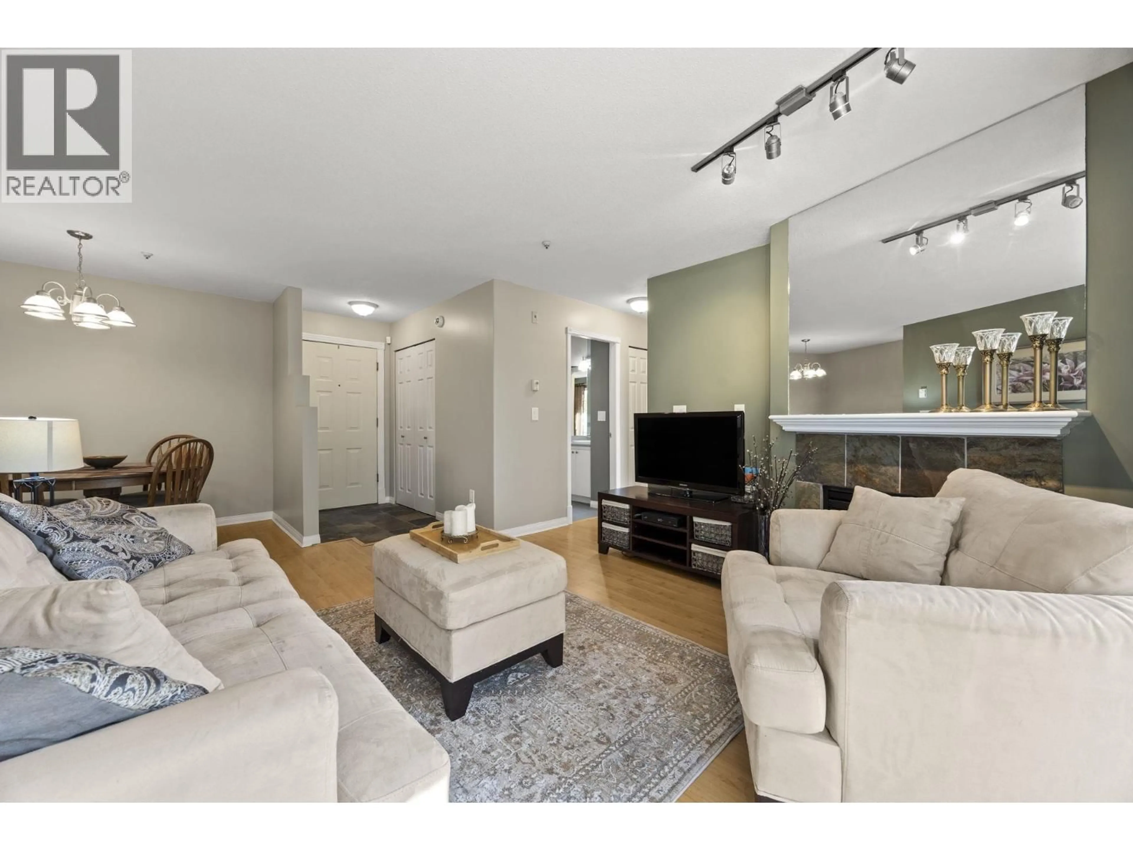 Living room with furniture, unknown for 404 - 2388 WELCHER AVENUE, Port Coquitlam British Columbia V3C1X5