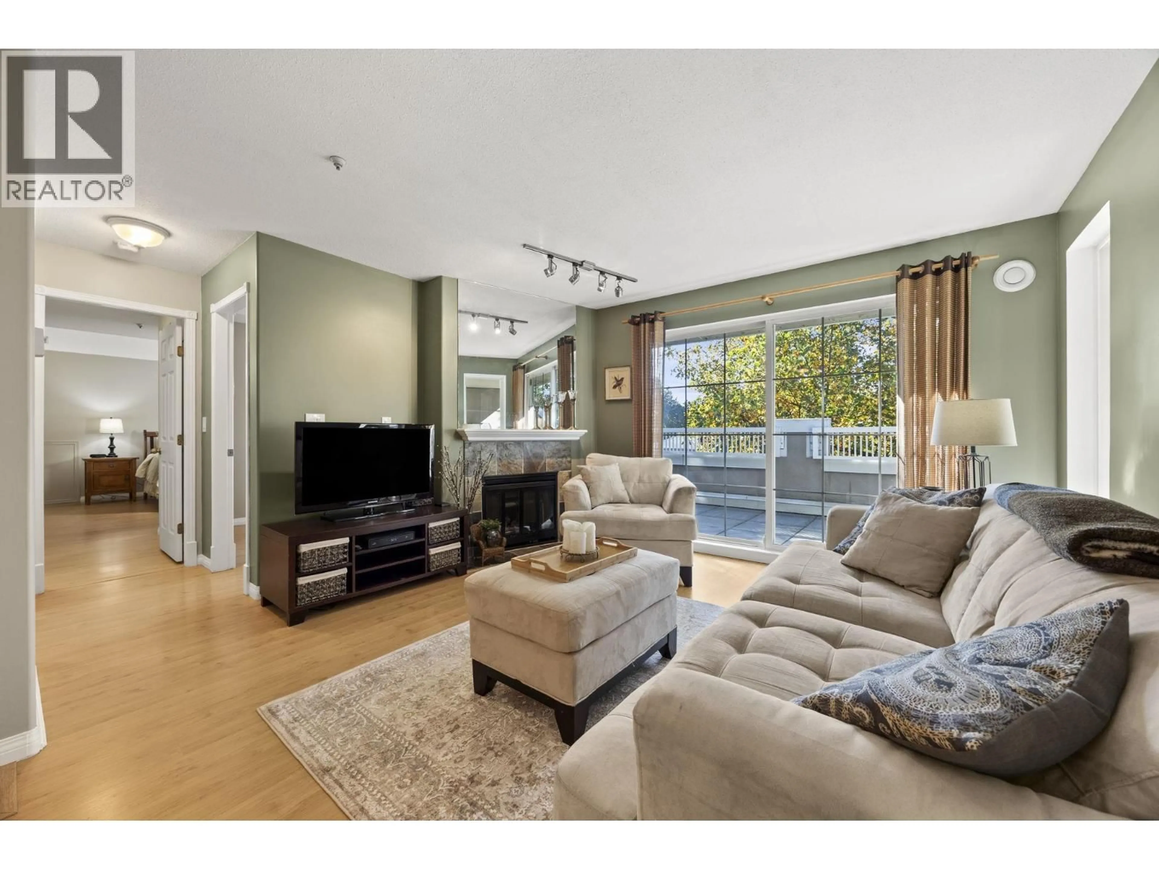 Living room with furniture, unknown for 404 - 2388 WELCHER AVENUE, Port Coquitlam British Columbia V3C1X5