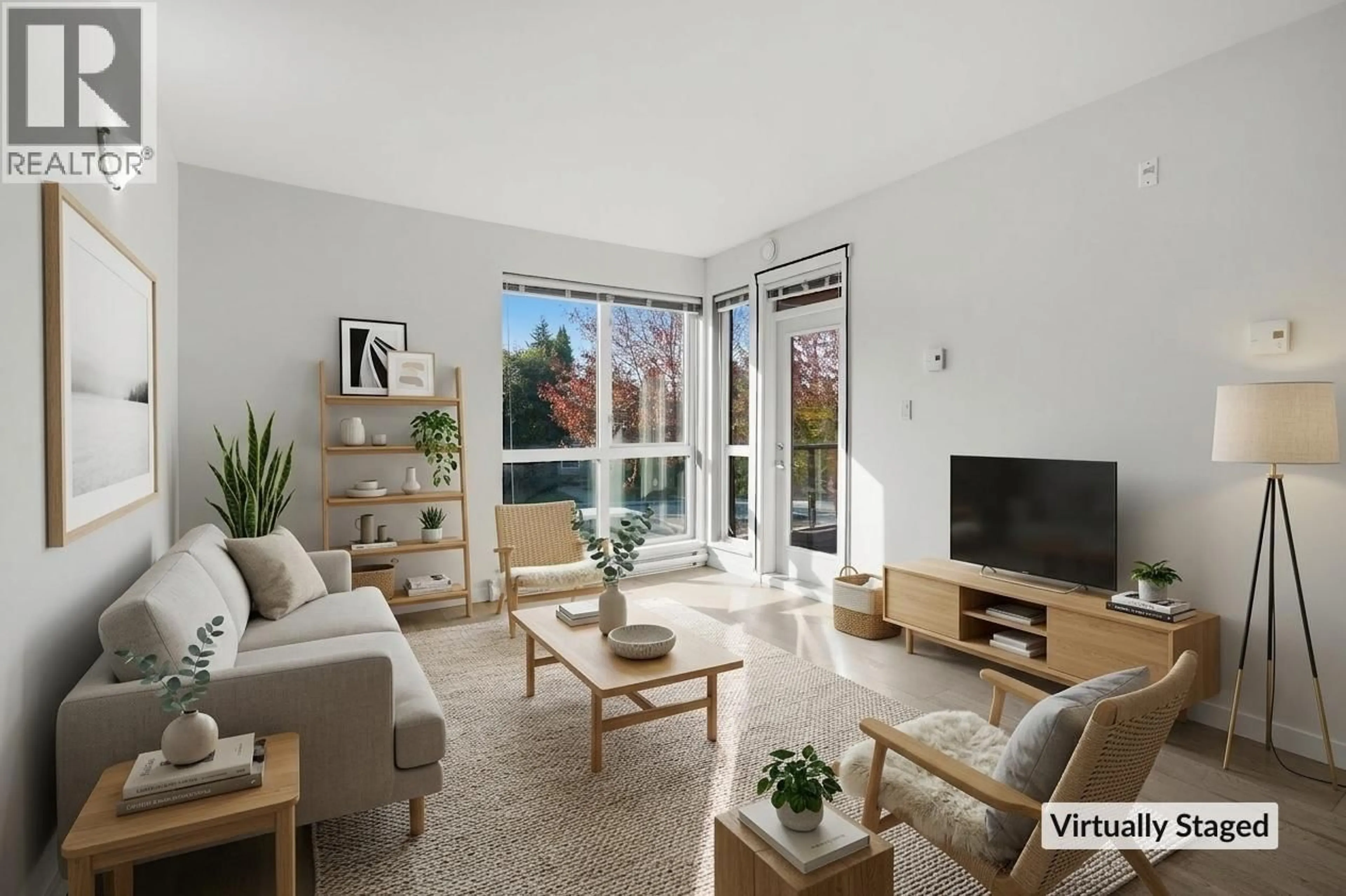 Living room with furniture, unknown for 206 - 2267 PITT RIVER ROAD, Port Coquitlam British Columbia V3C1R7