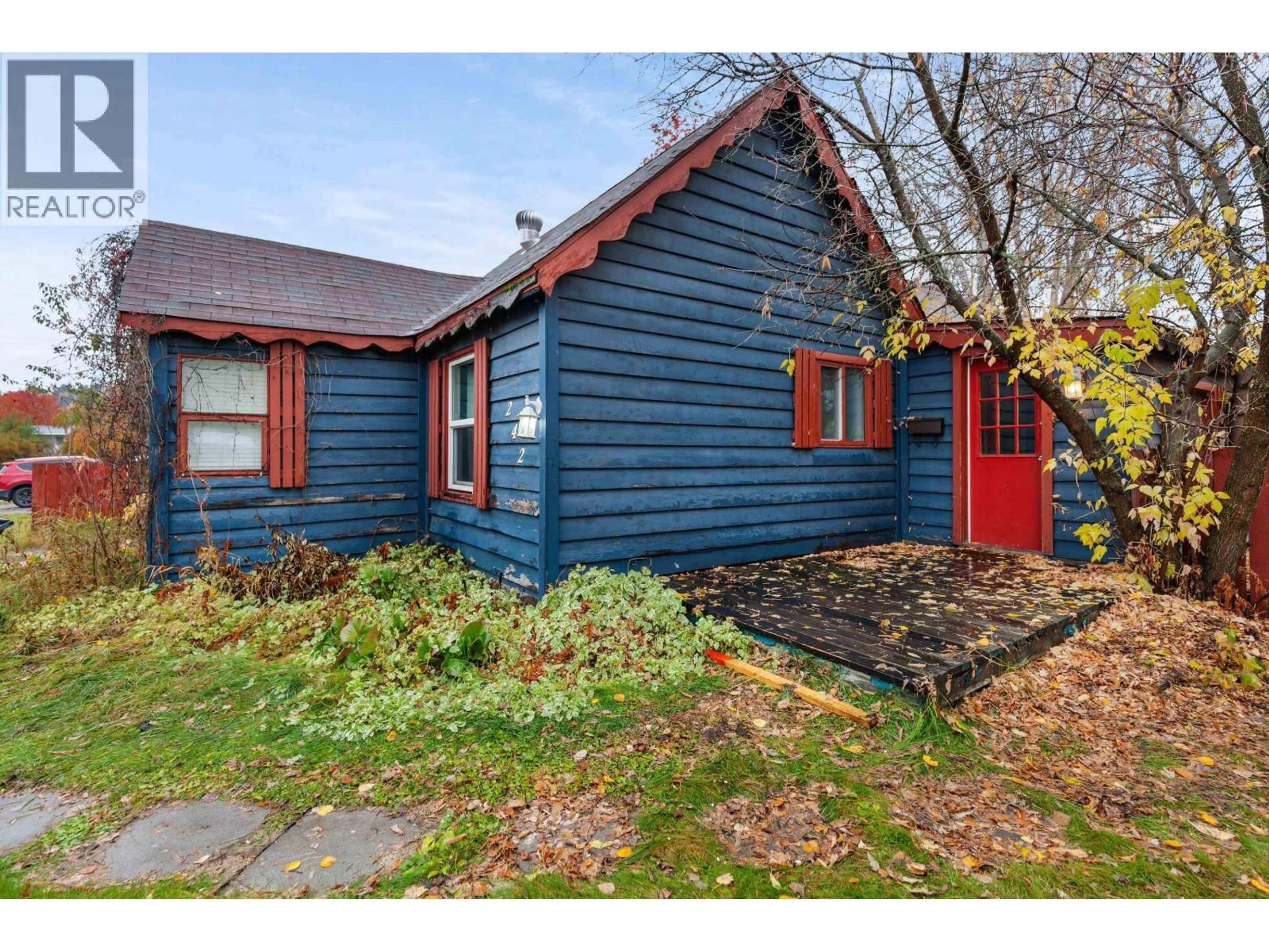 Home with vinyl exterior material, street for 242 DOUGLAS STREET, Prince George British Columbia V2M2M1