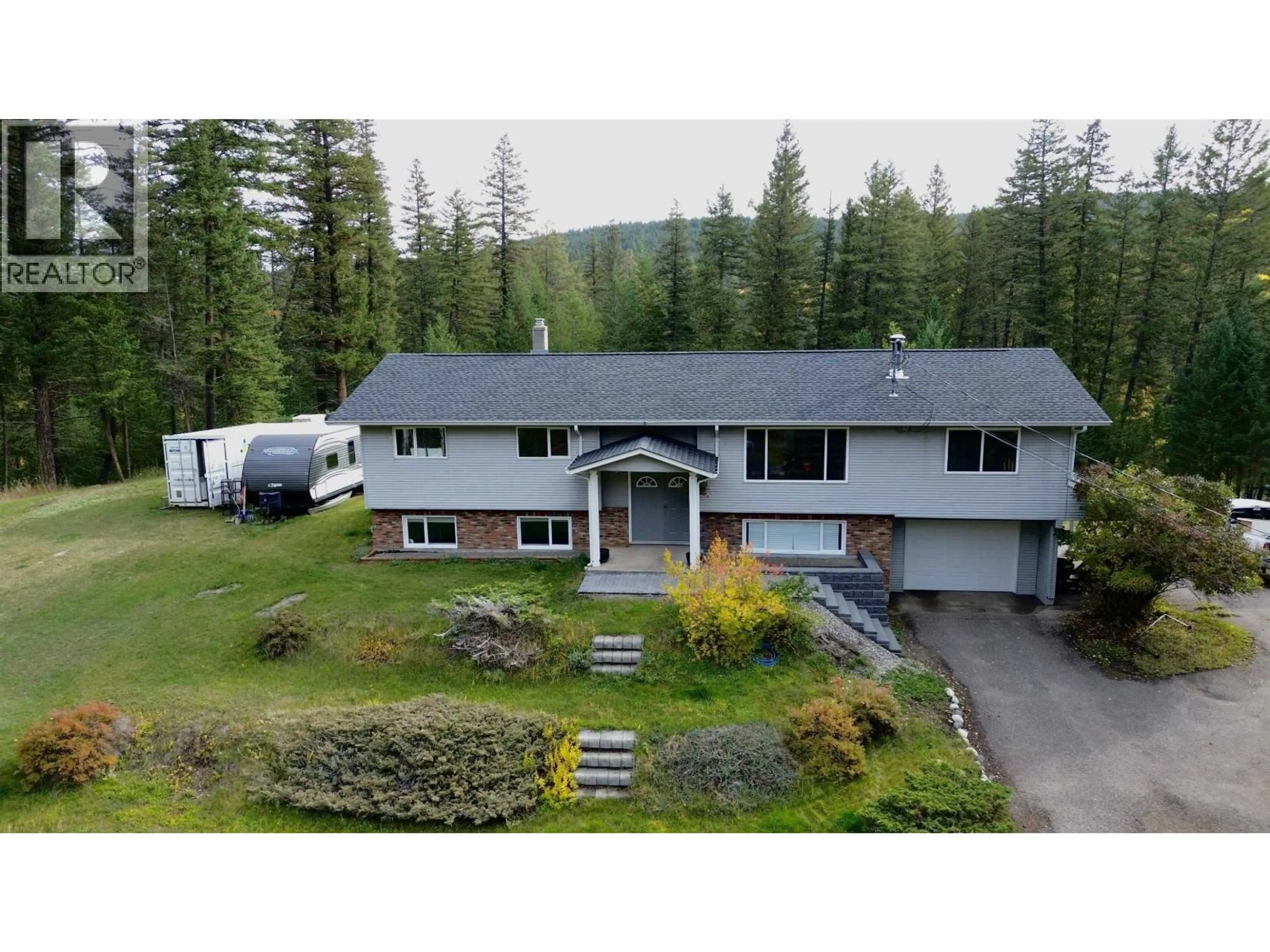 A pic from outside/outdoor area/front of a property/back of a property/a pic from drone, mountain view for 1300 GUN-A-NOOT TRAIL, Williams Lake British Columbia V2G3H7