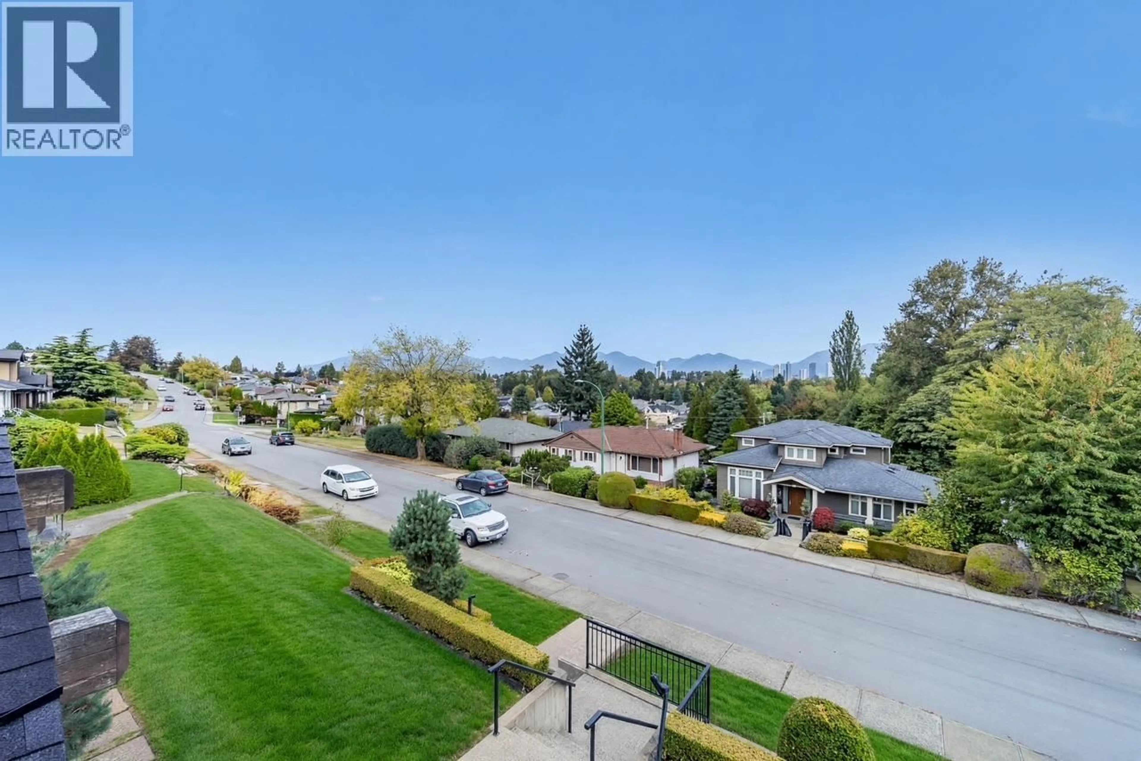 A pic from outside/outdoor area/front of a property/back of a property/a pic from drone, mountain view for 4294 PRICE CRESCENT, Burnaby British Columbia V5G2N2