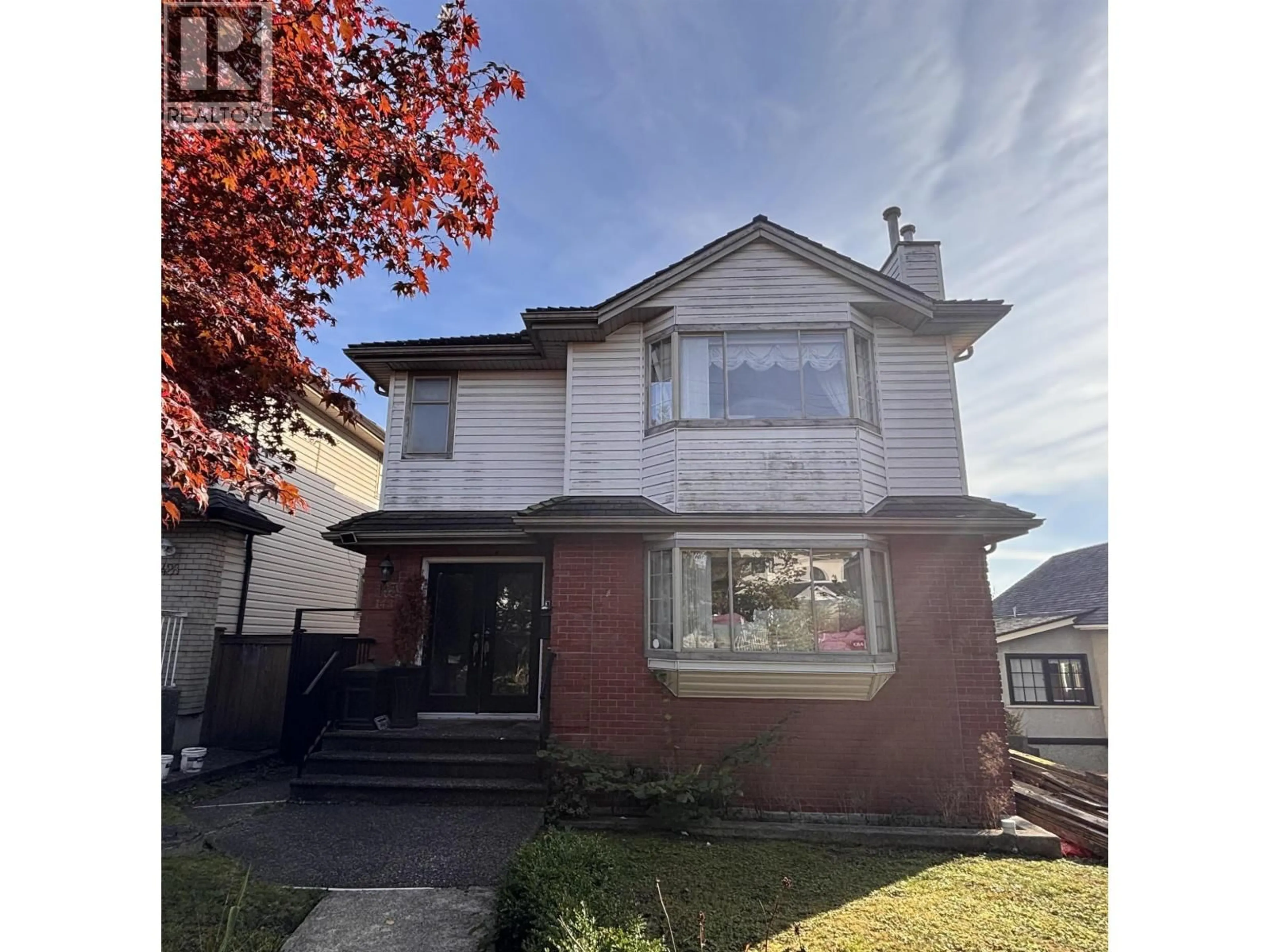 Home with vinyl exterior material, street for 1438 64TH AVENUE, Vancouver British Columbia V6P2N4