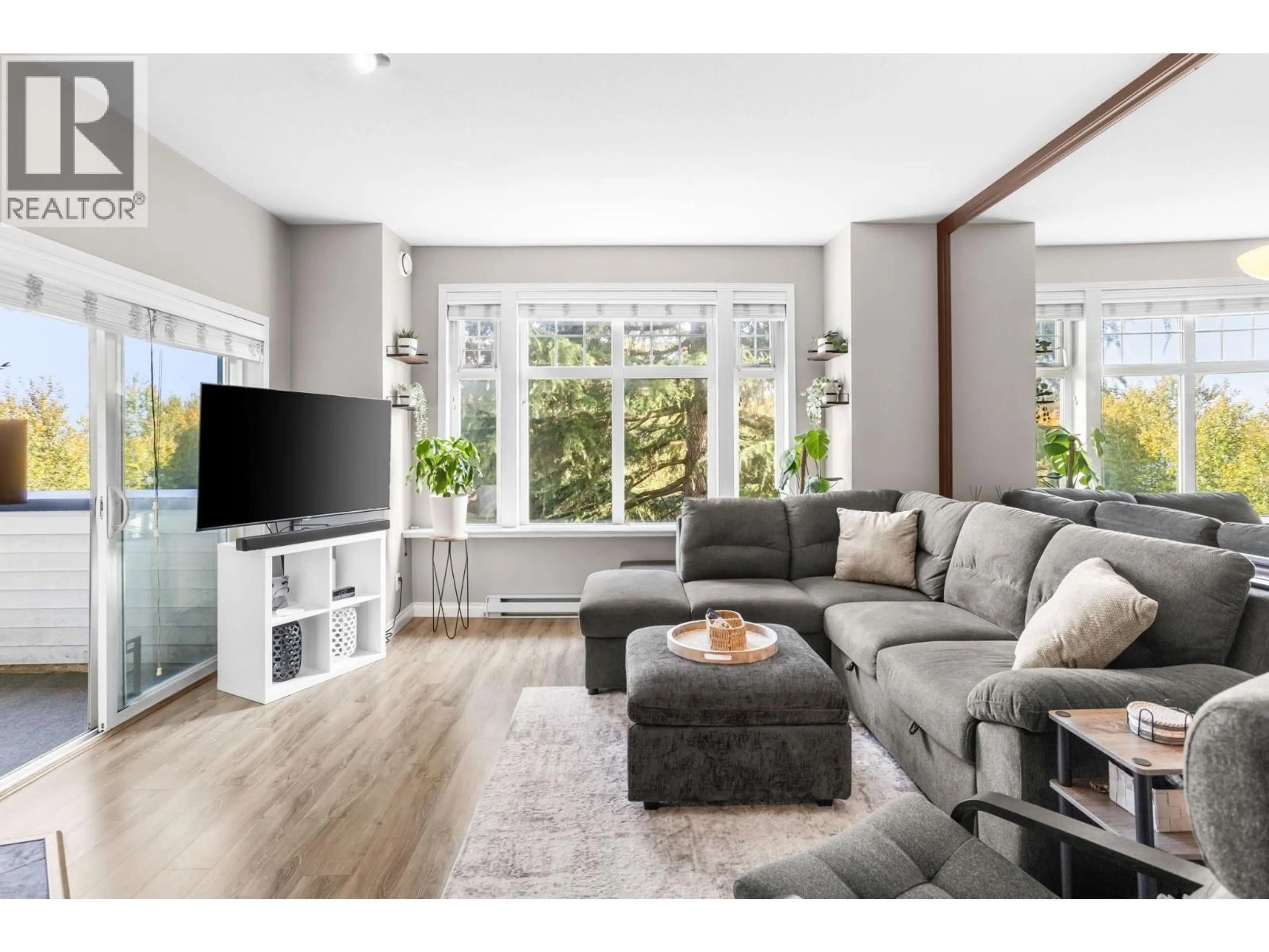 Living room with furniture, unknown for 211 - 83 STAR CRESCENT, New Westminster British Columbia V3M6X8