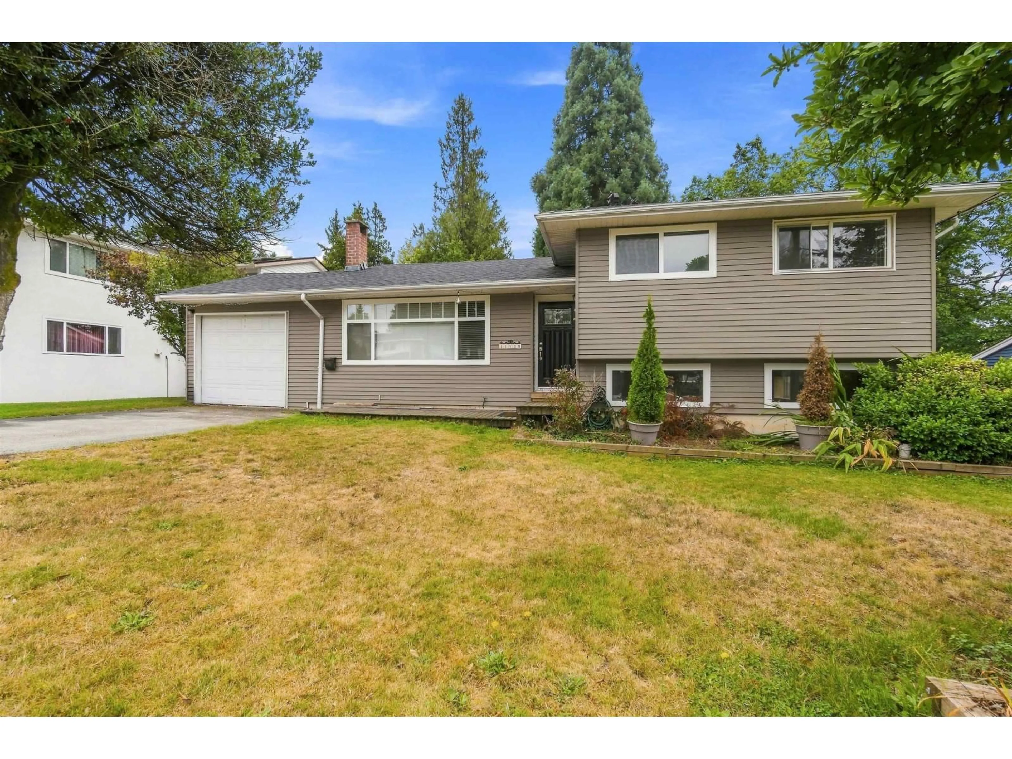 Home with vinyl exterior material, street for 11530 95A AVENUE, Delta British Columbia V4C3V5