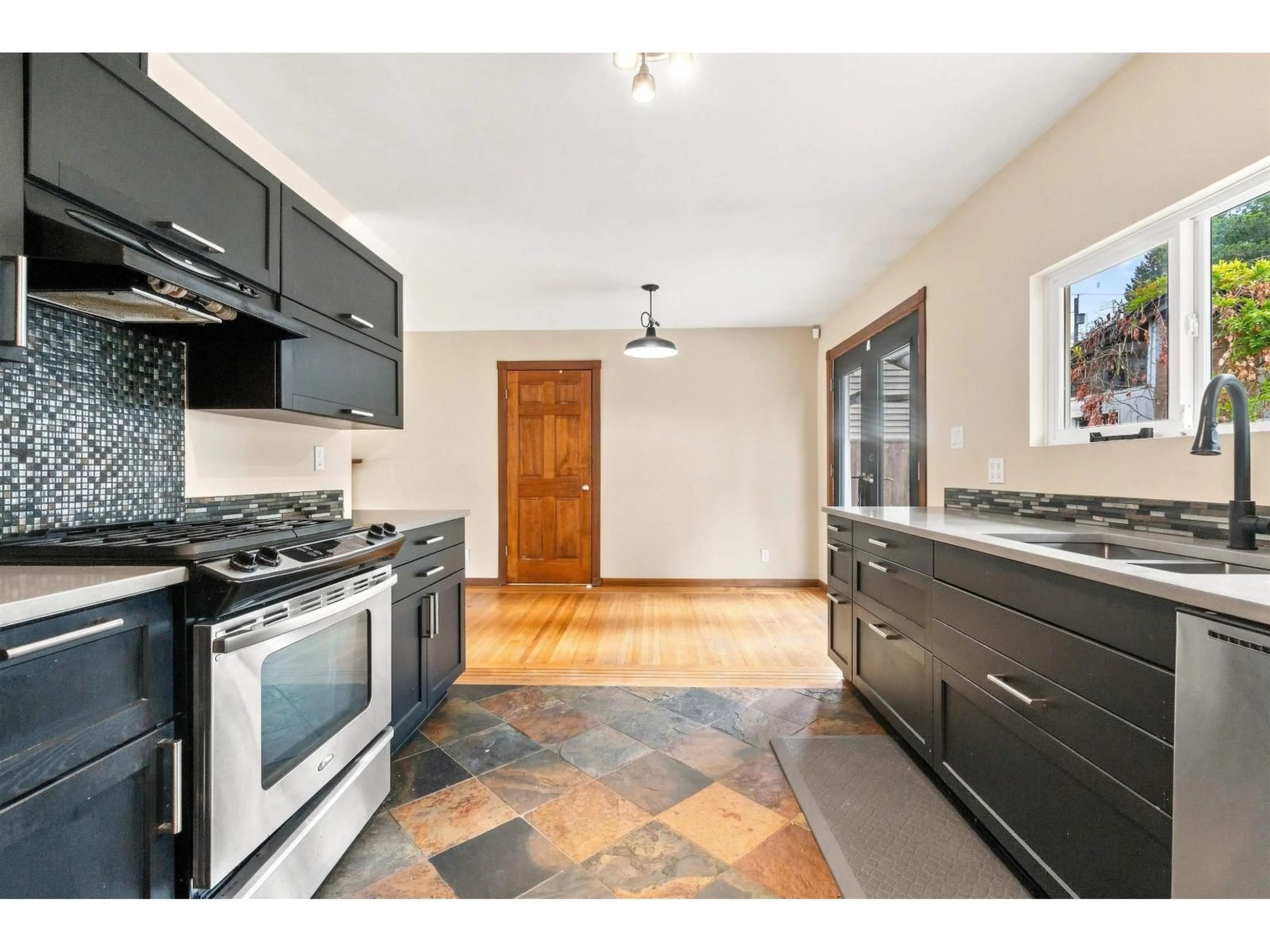 Standard kitchen, ceramic/tile floor for 11530 95A AVENUE, Delta British Columbia V4C3V5