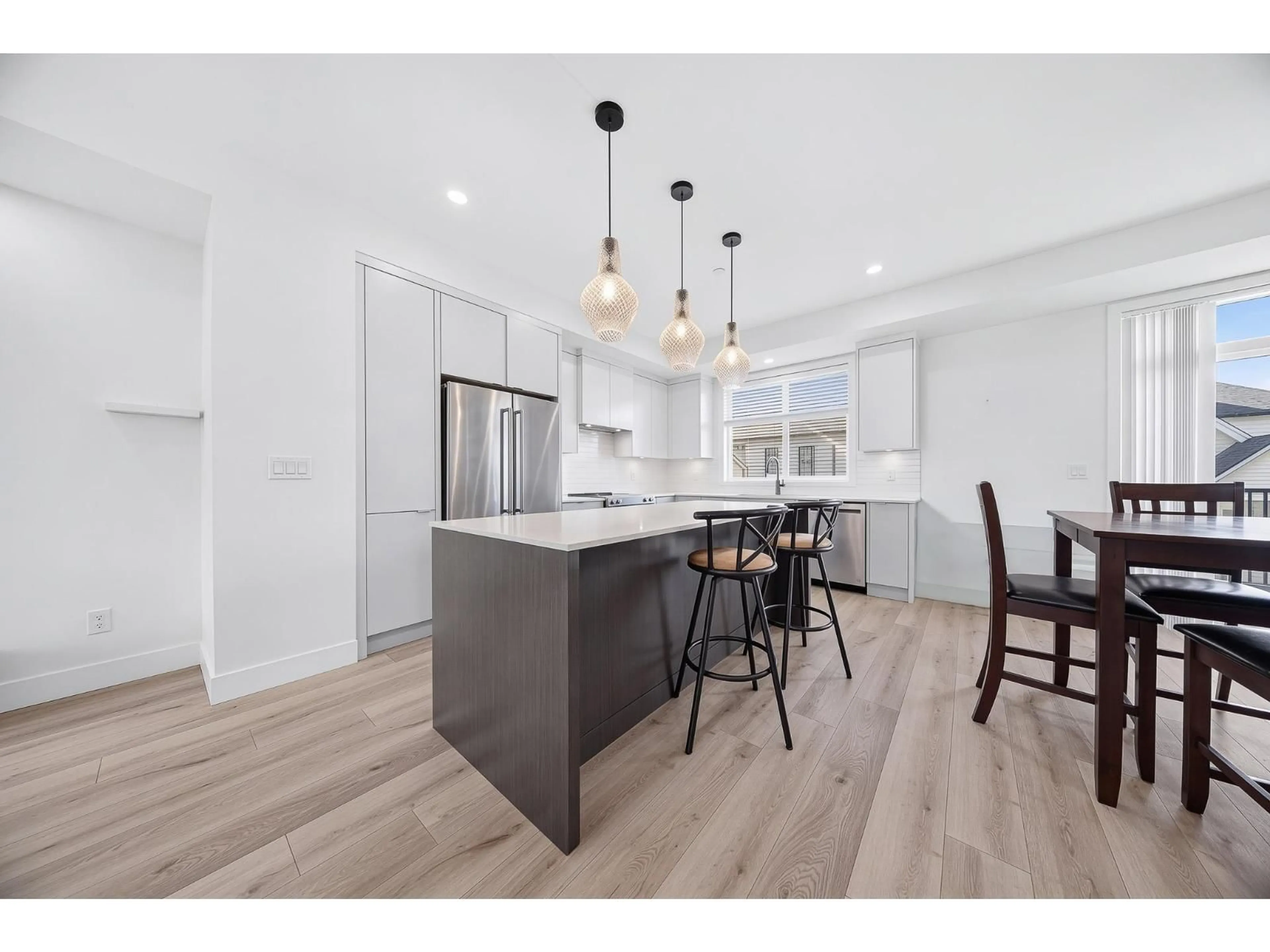 Open concept kitchen, wood/laminate floor for 209 - 46211 PROMONTORY ROAD, Chilliwack British Columbia V2R6E4