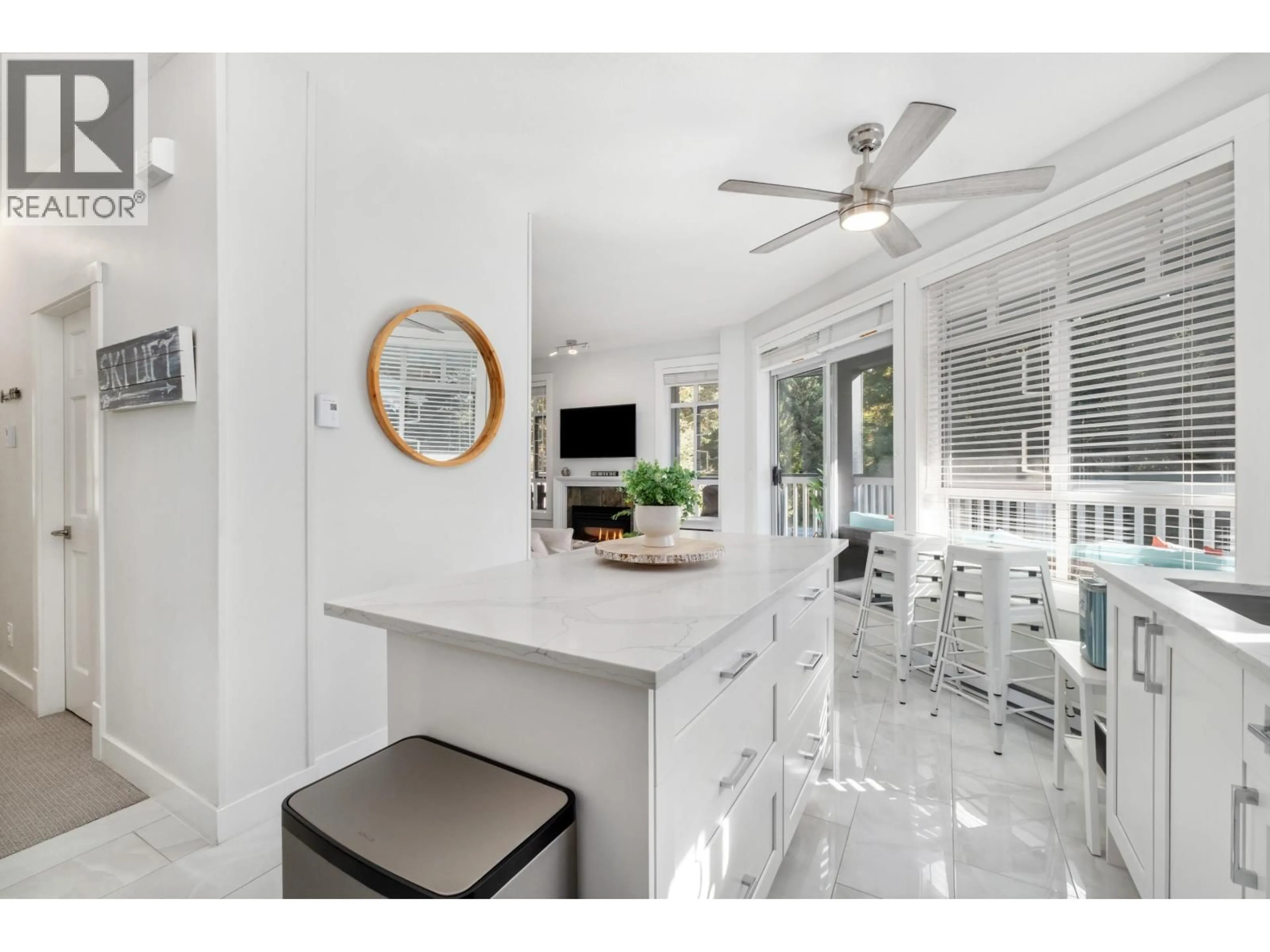 Open concept kitchen, ceramic/tile floor for 311 - 4405 BLACKCOMB WAY, Whistler British Columbia V8E0X7