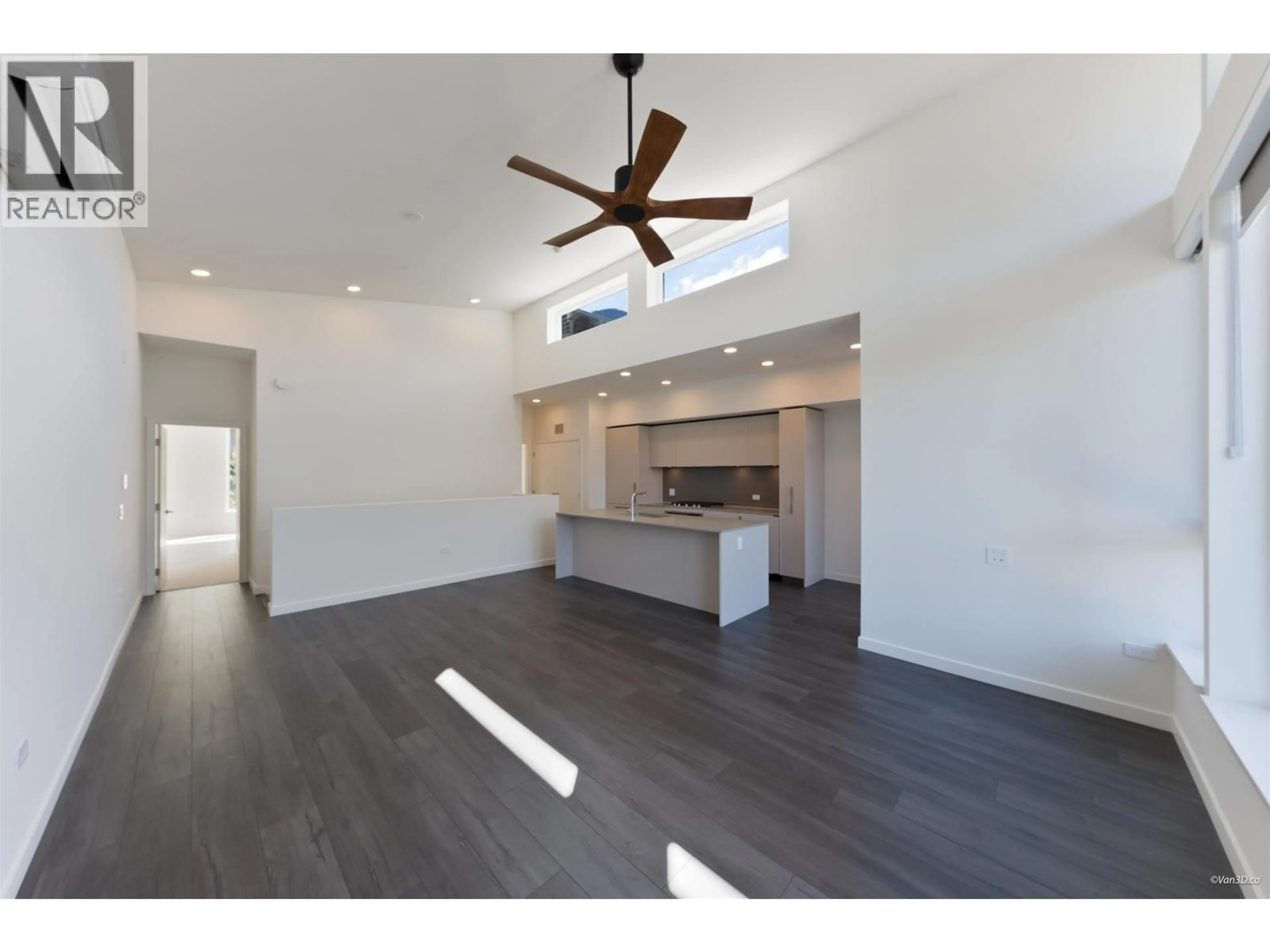 Open concept kitchen, wood/laminate floor for 208 - 1502 SCOTT CRESCENT, Squamish British Columbia V8B1G4