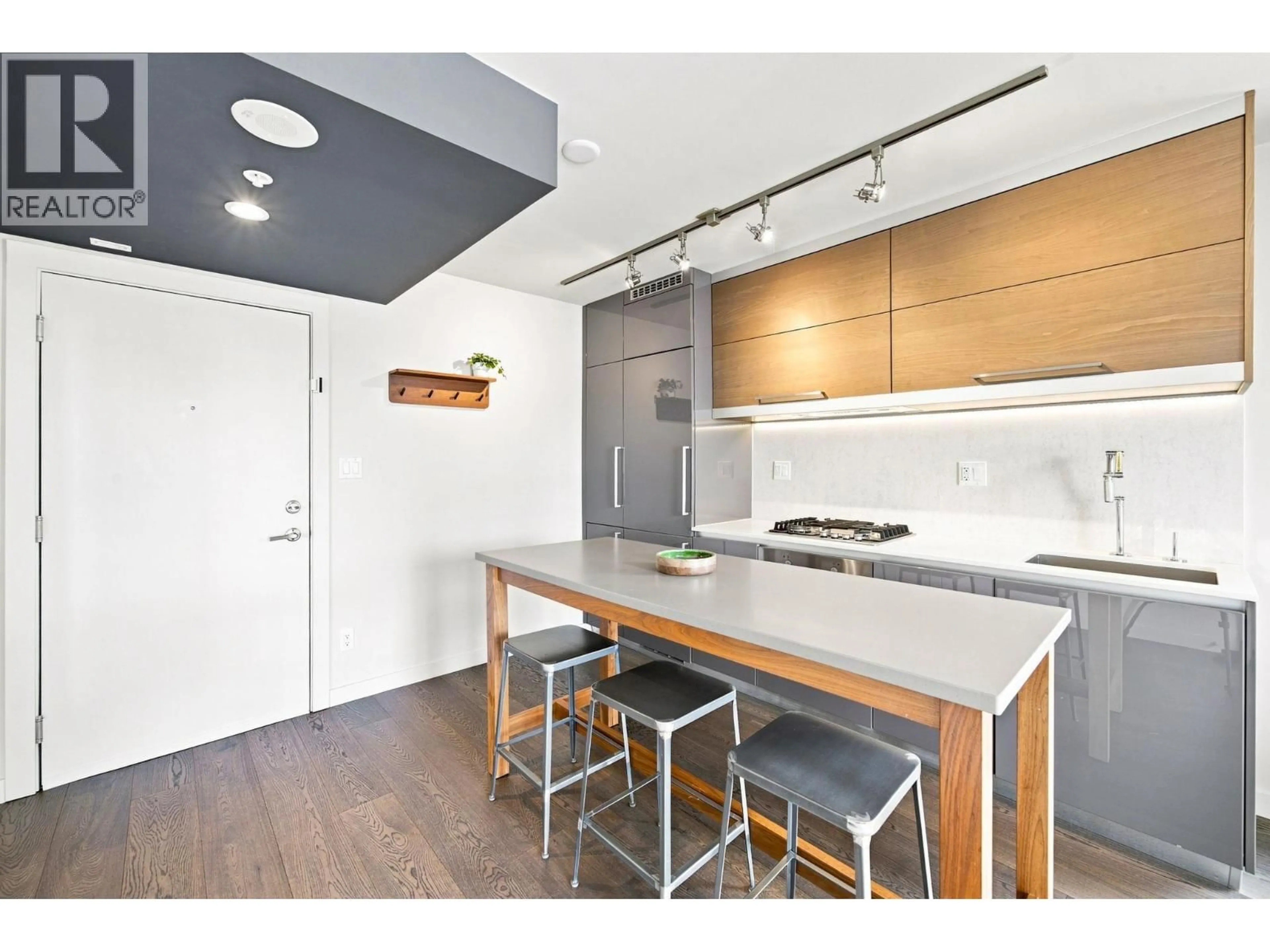 Open concept kitchen, wood/laminate floor for 1006 - 189 KEEFER STREET, Vancouver British Columbia V6A0C8