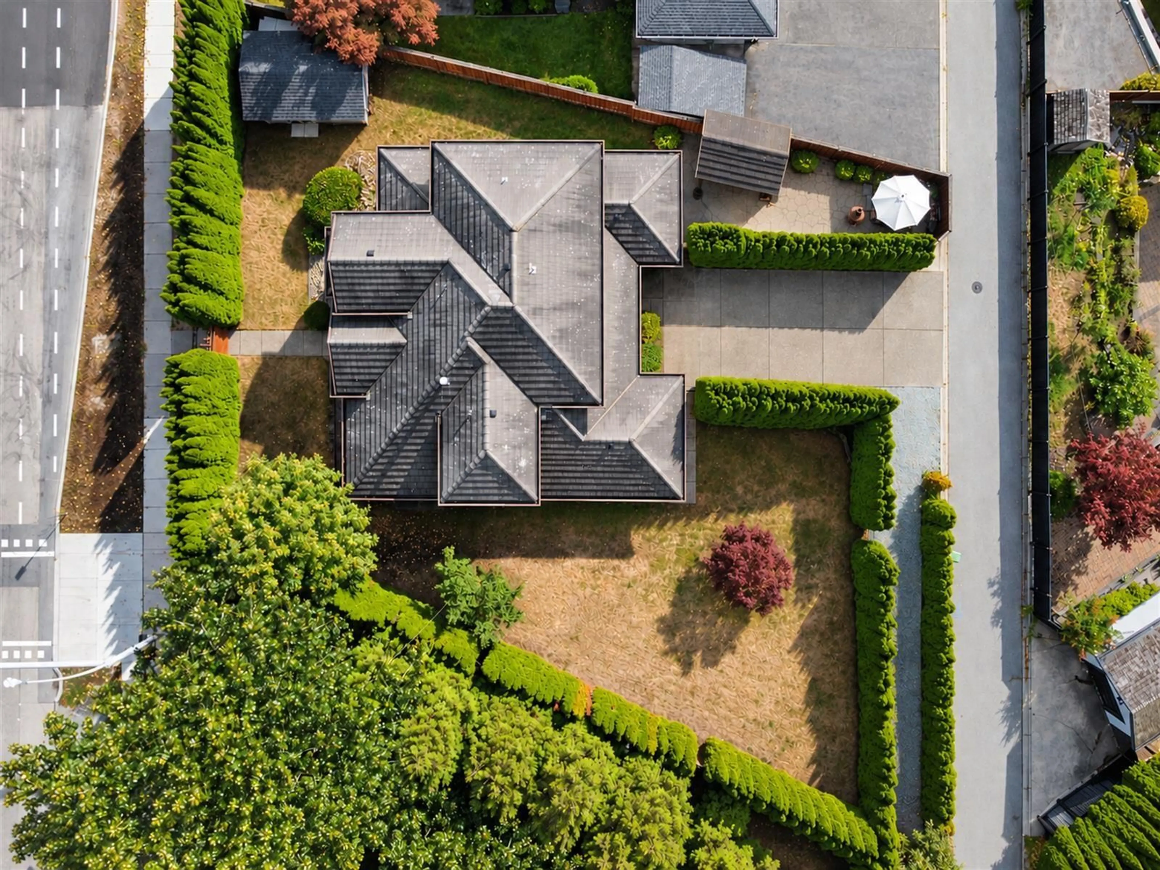A pic from outside/outdoor area/front of a property/back of a property/a pic from drone, street for 8055 144TH STREET, Surrey British Columbia V3W5T3