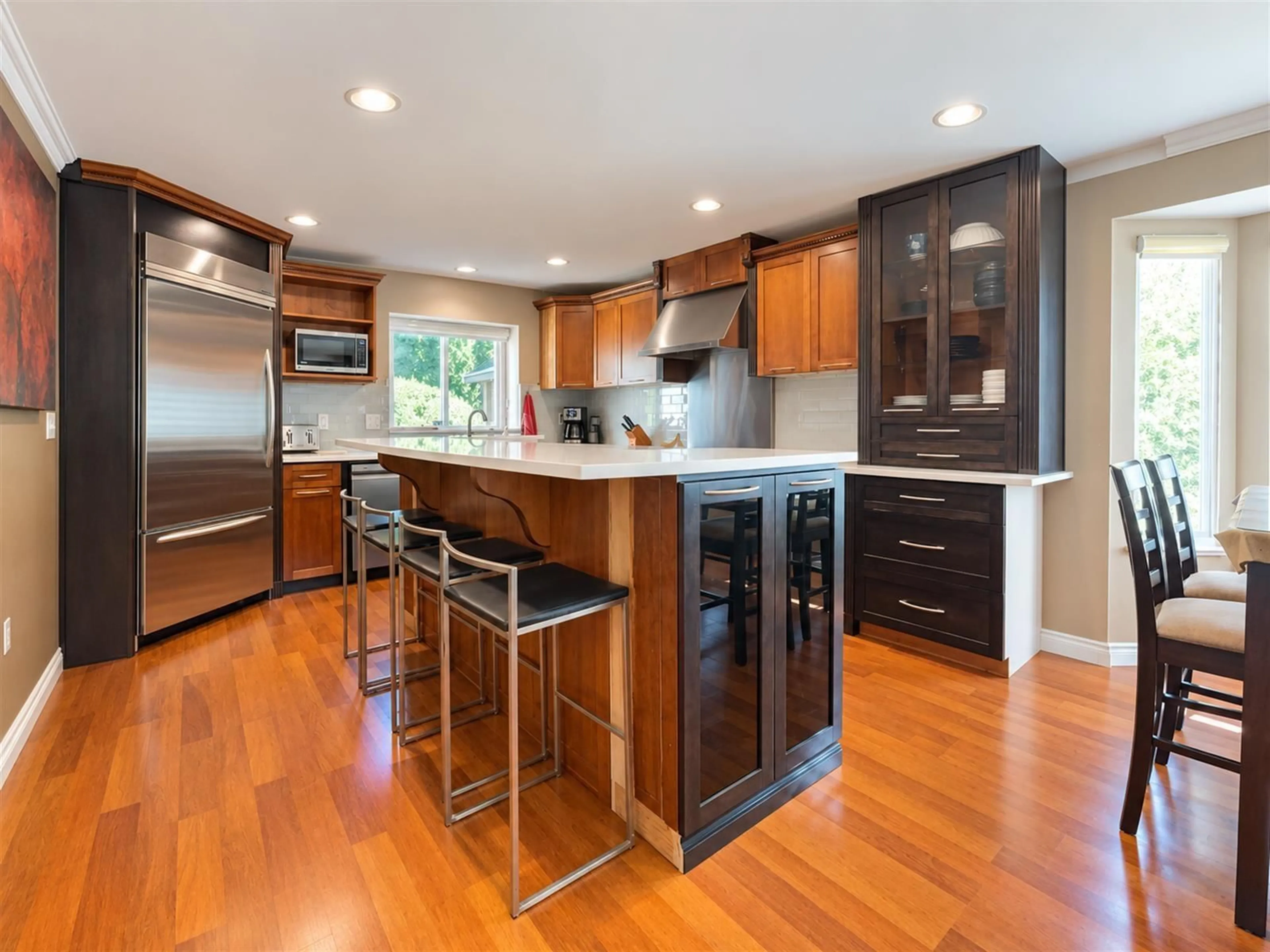 Contemporary kitchen, wood/laminate floor for 8055 144TH STREET, Surrey British Columbia V3W5T3