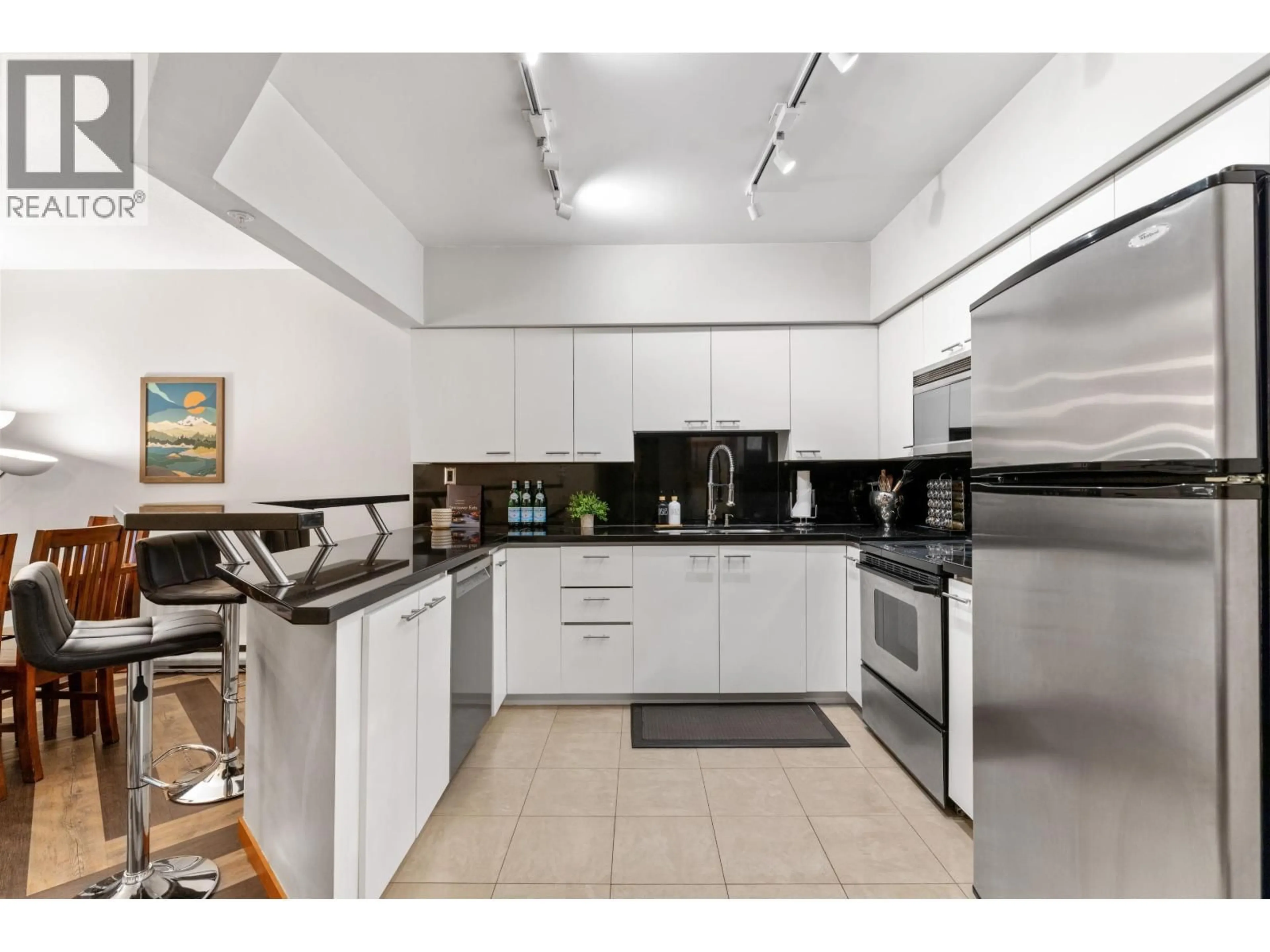 Standard kitchen, ceramic/tile floor for 102 - 4821 SPEARHEAD DRIVE, Whistler British Columbia V8E1E8