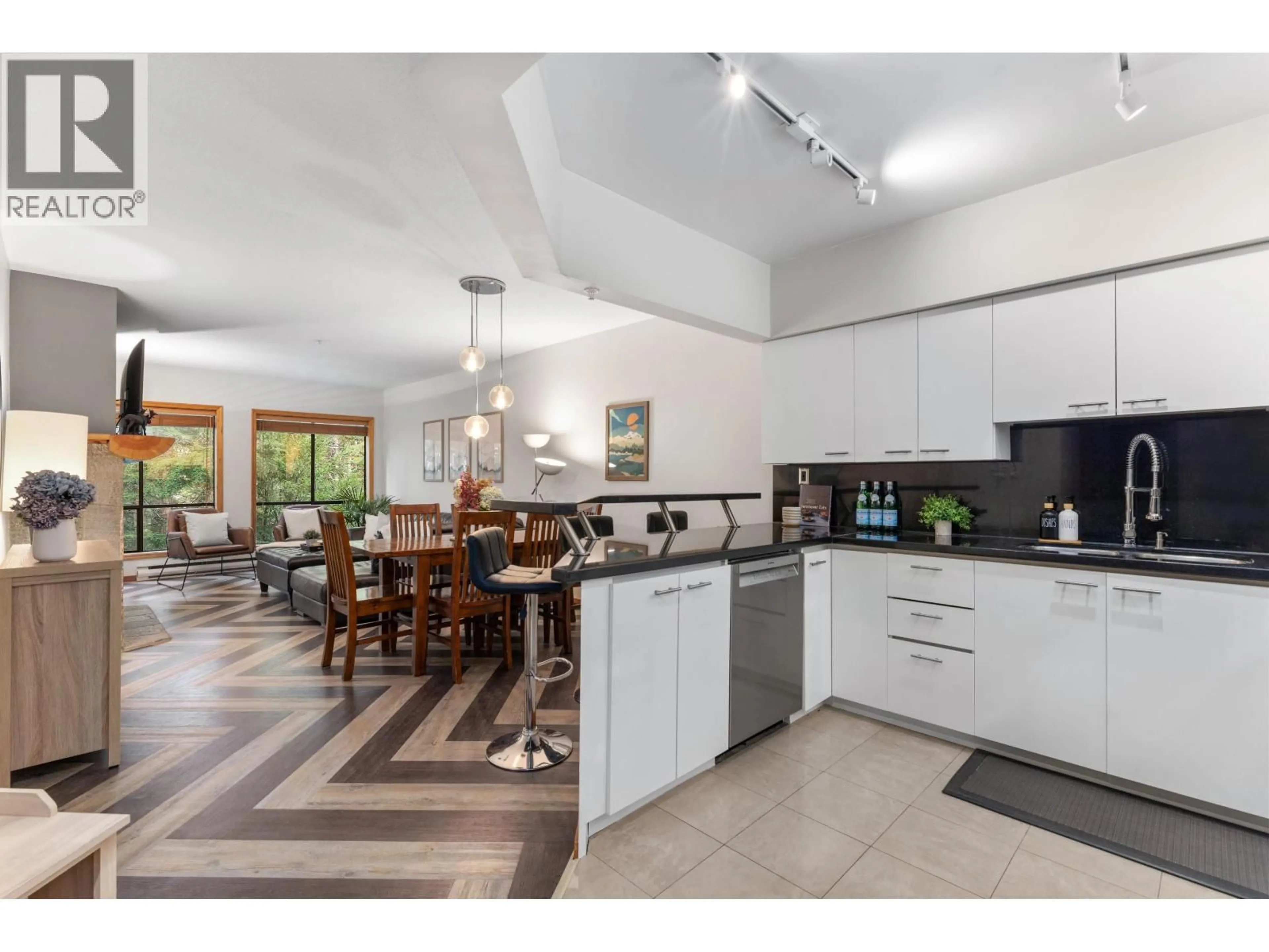 Open concept kitchen, ceramic/tile floor for 102 - 4821 SPEARHEAD DRIVE, Whistler British Columbia V8E1E8