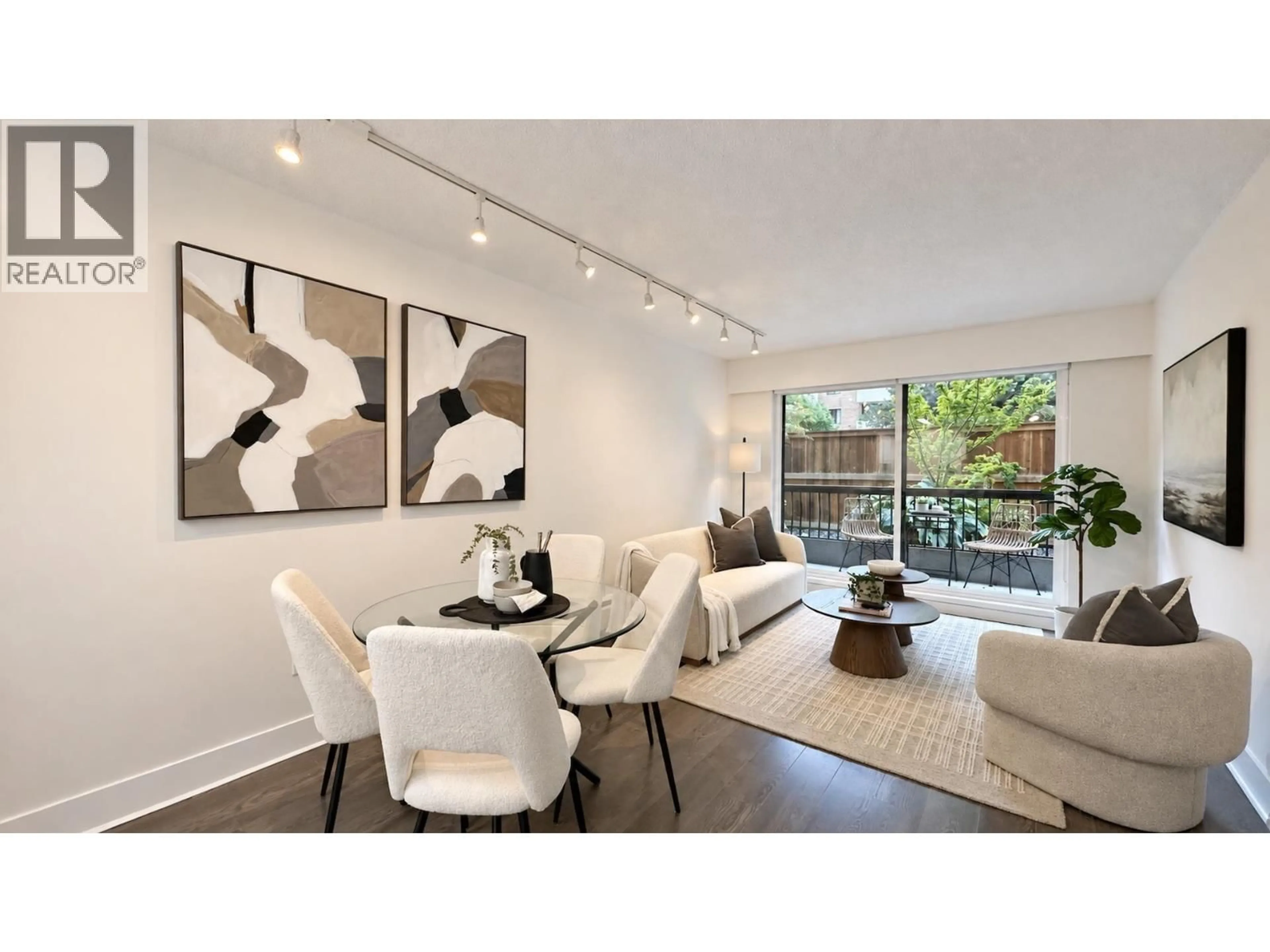 Living room with furniture, wood/laminate floor for 110 - 2033 7TH AVENUE, Vancouver British Columbia V6J1T3