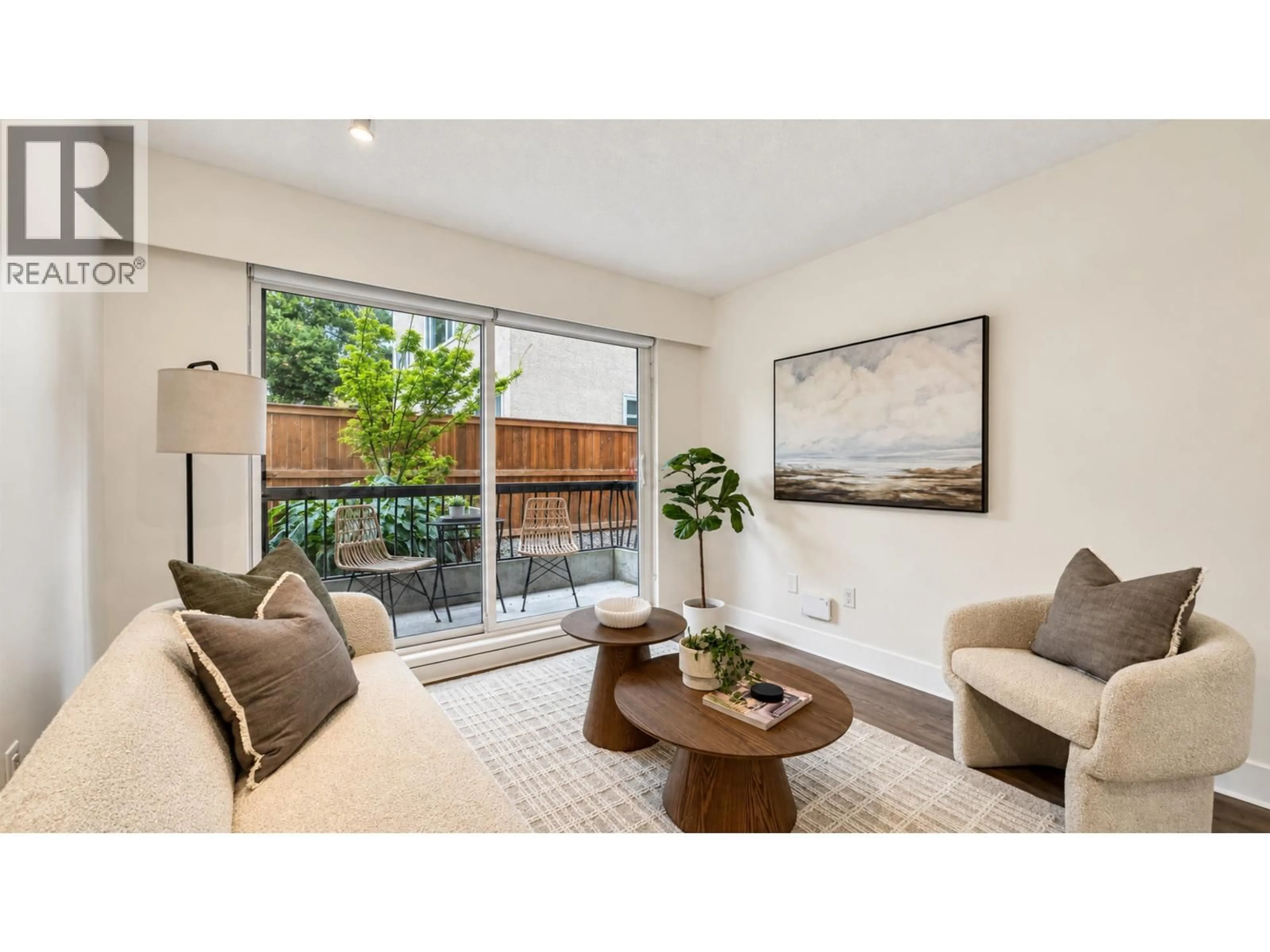 Living room with furniture, wood/laminate floor for 110 - 2033 7TH AVENUE, Vancouver British Columbia V6J1T3