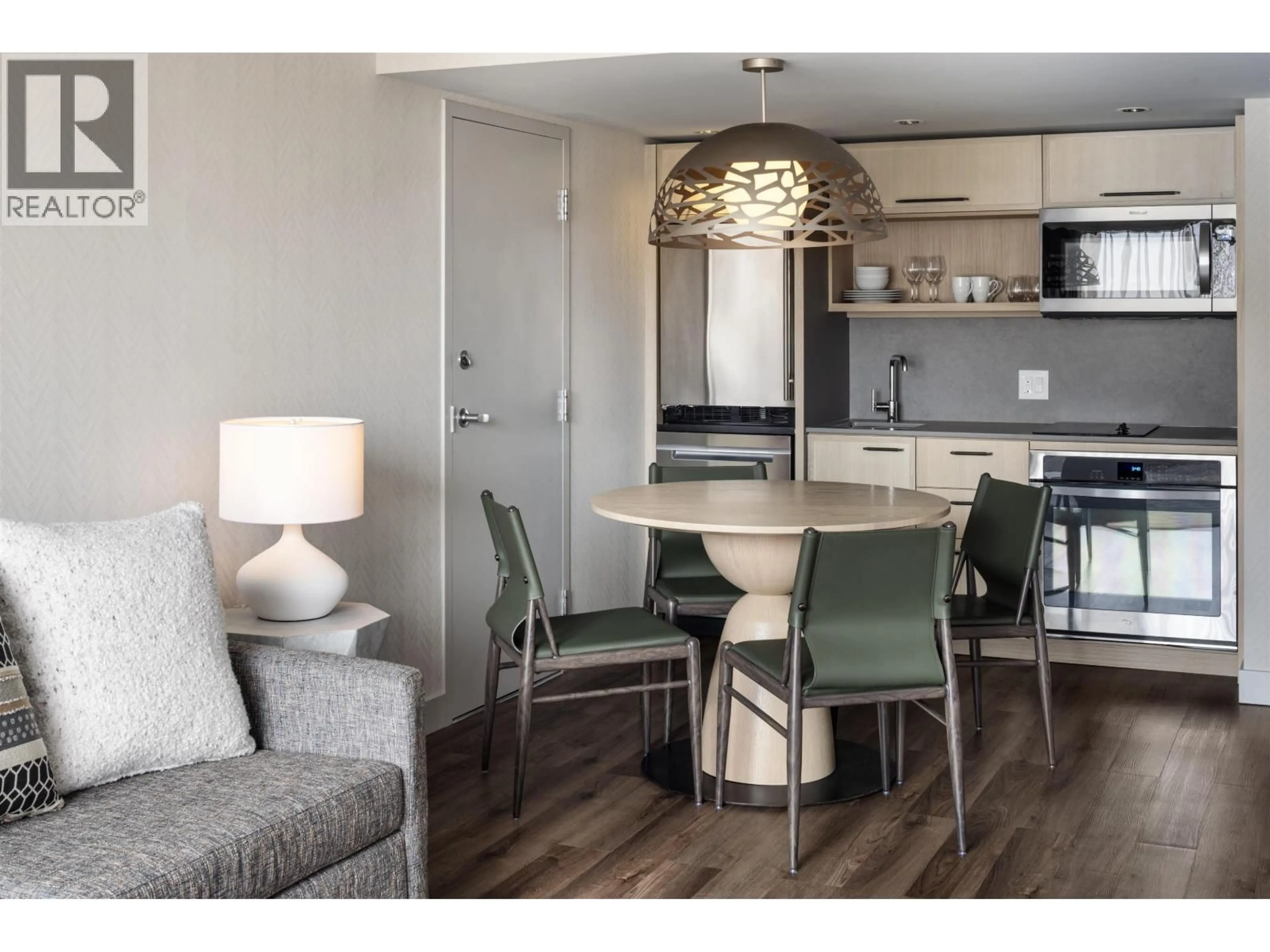 Open concept kitchen, wood/laminate floor for 715 - 4090 WHISTLER WAY, Whistler British Columbia V8E1J3