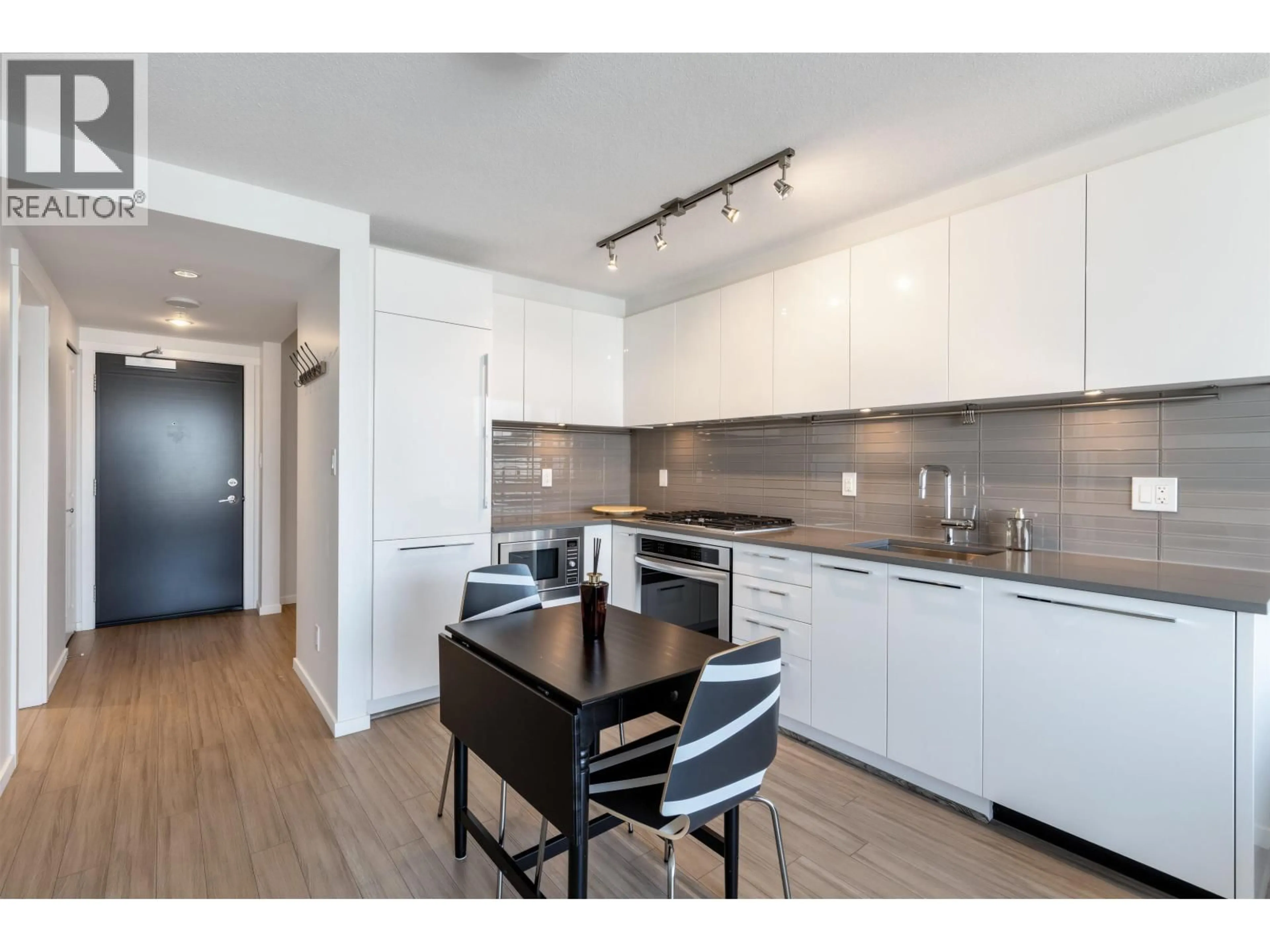 Open concept kitchen, wood/laminate floor for 2008 - 6658 DOW AVENUE, Burnaby British Columbia V5H0C7