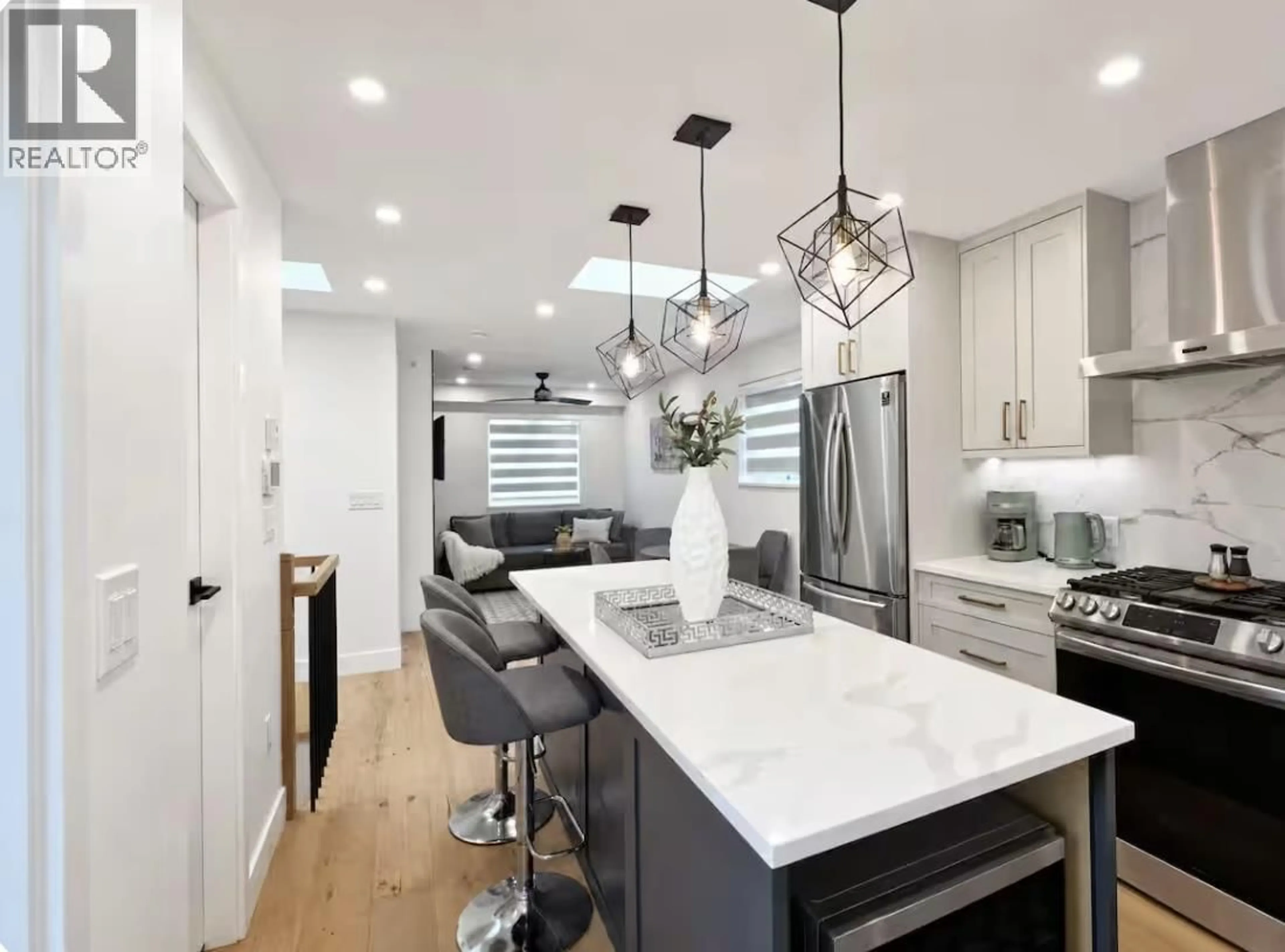 Contemporary kitchen, ceramic/tile floor for 5439 KILLARNEY STREET, Vancouver British Columbia V5R3W3