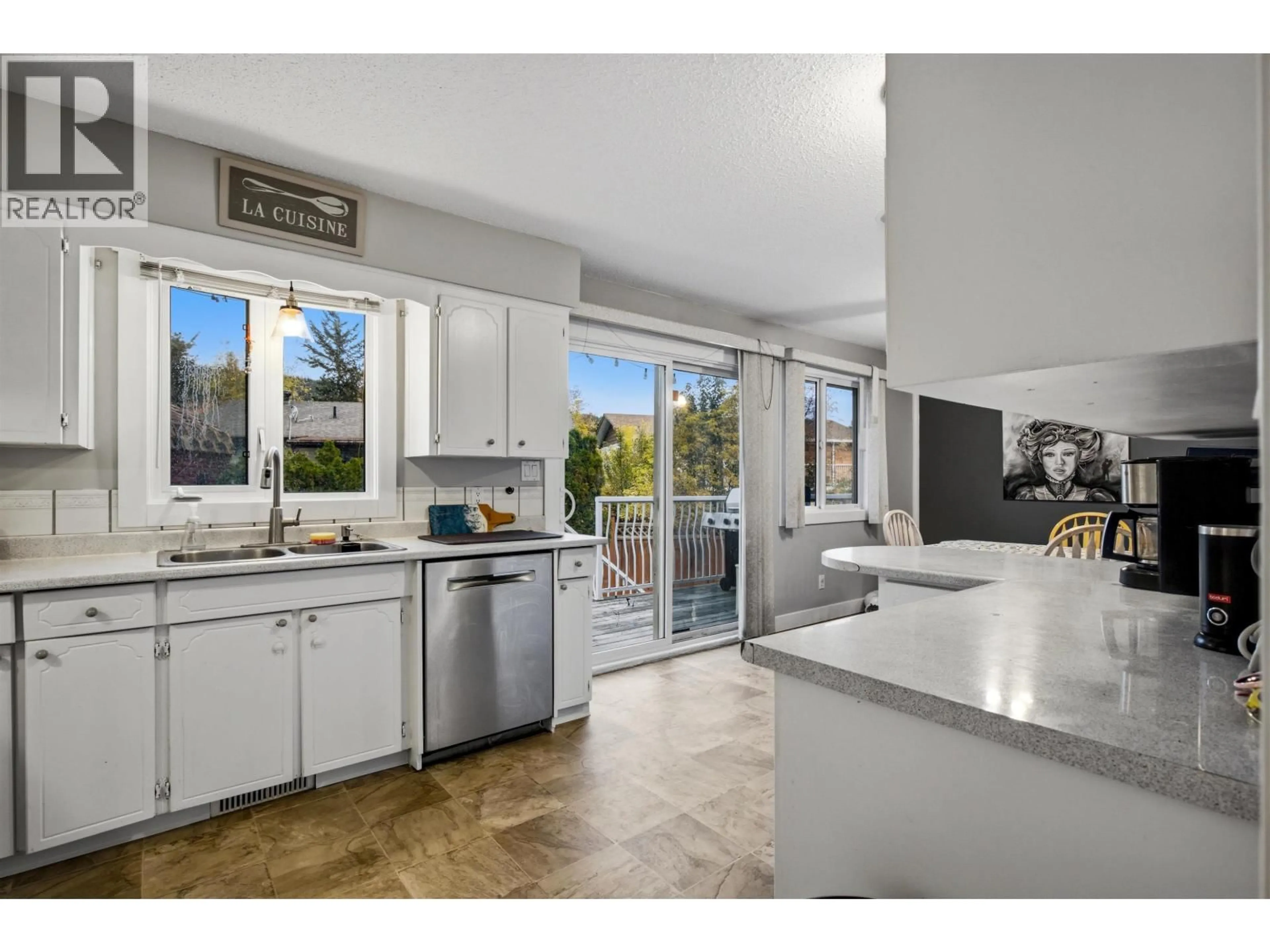 Open concept kitchen, ceramic/tile floor for 220 CORNWALL CRESCENT, Williams Lake British Columbia V2G4H1