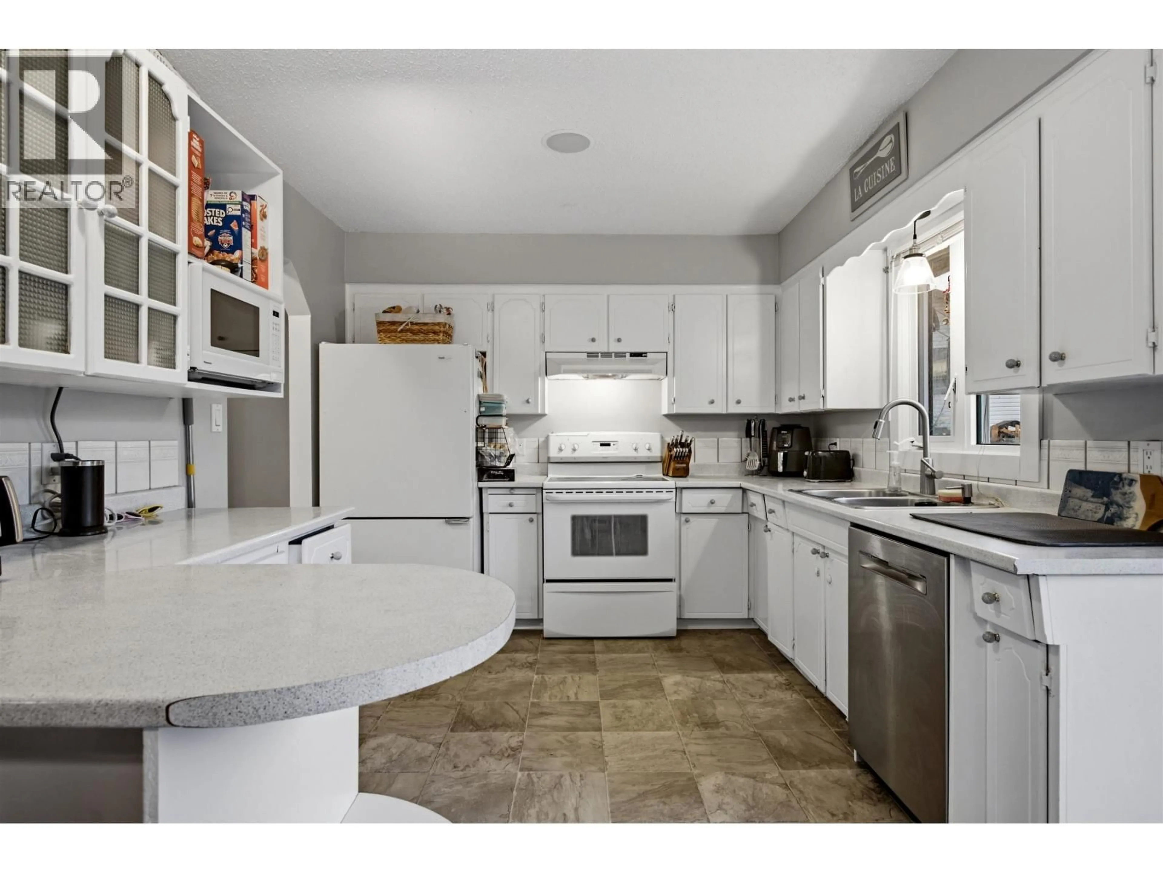 Standard kitchen, ceramic/tile floor for 220 CORNWALL CRESCENT, Williams Lake British Columbia V2G4H1