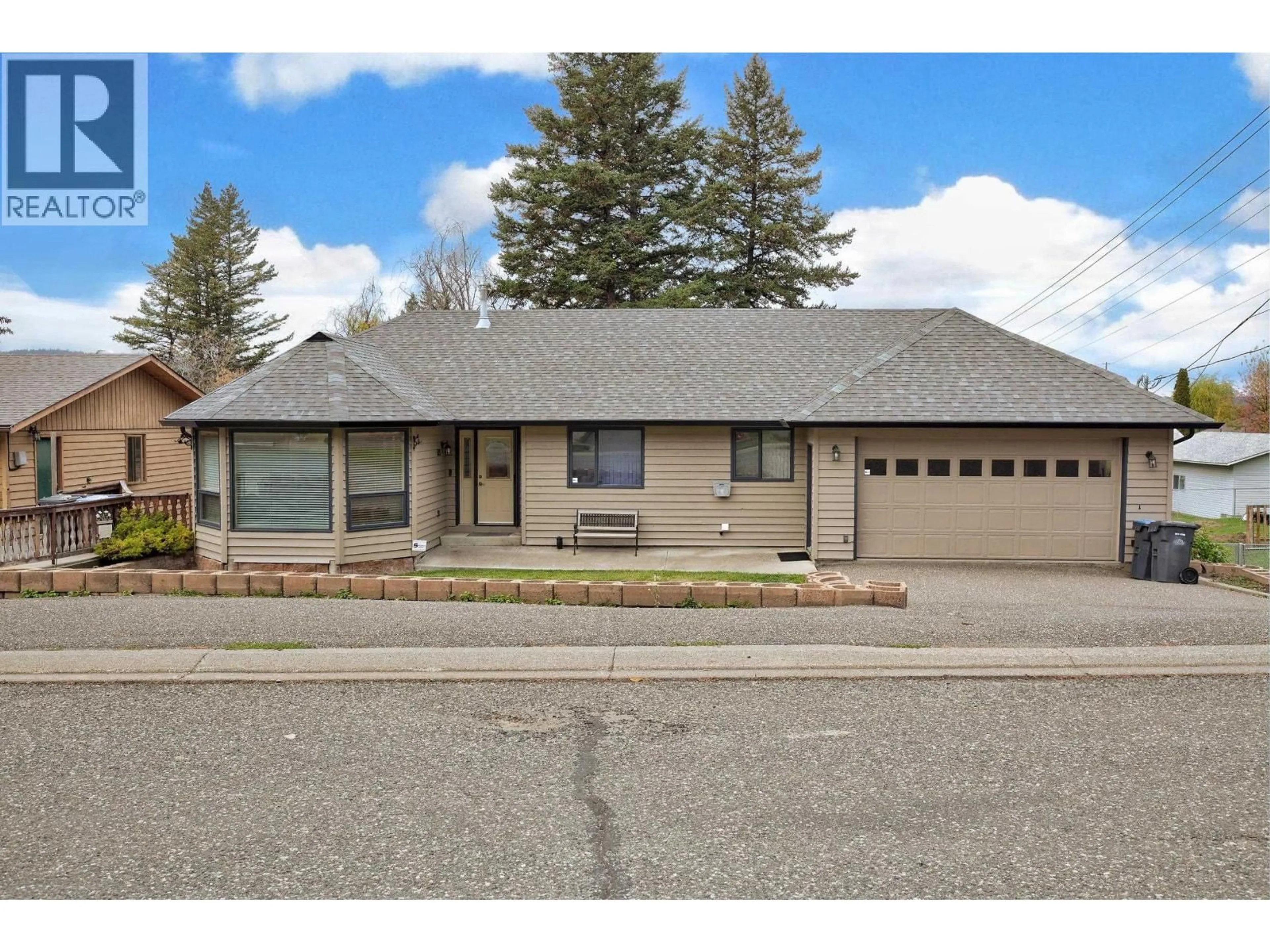 Home with vinyl exterior material, street for 599 PEARKES DRIVE, Williams Lake British Columbia V2G4B1