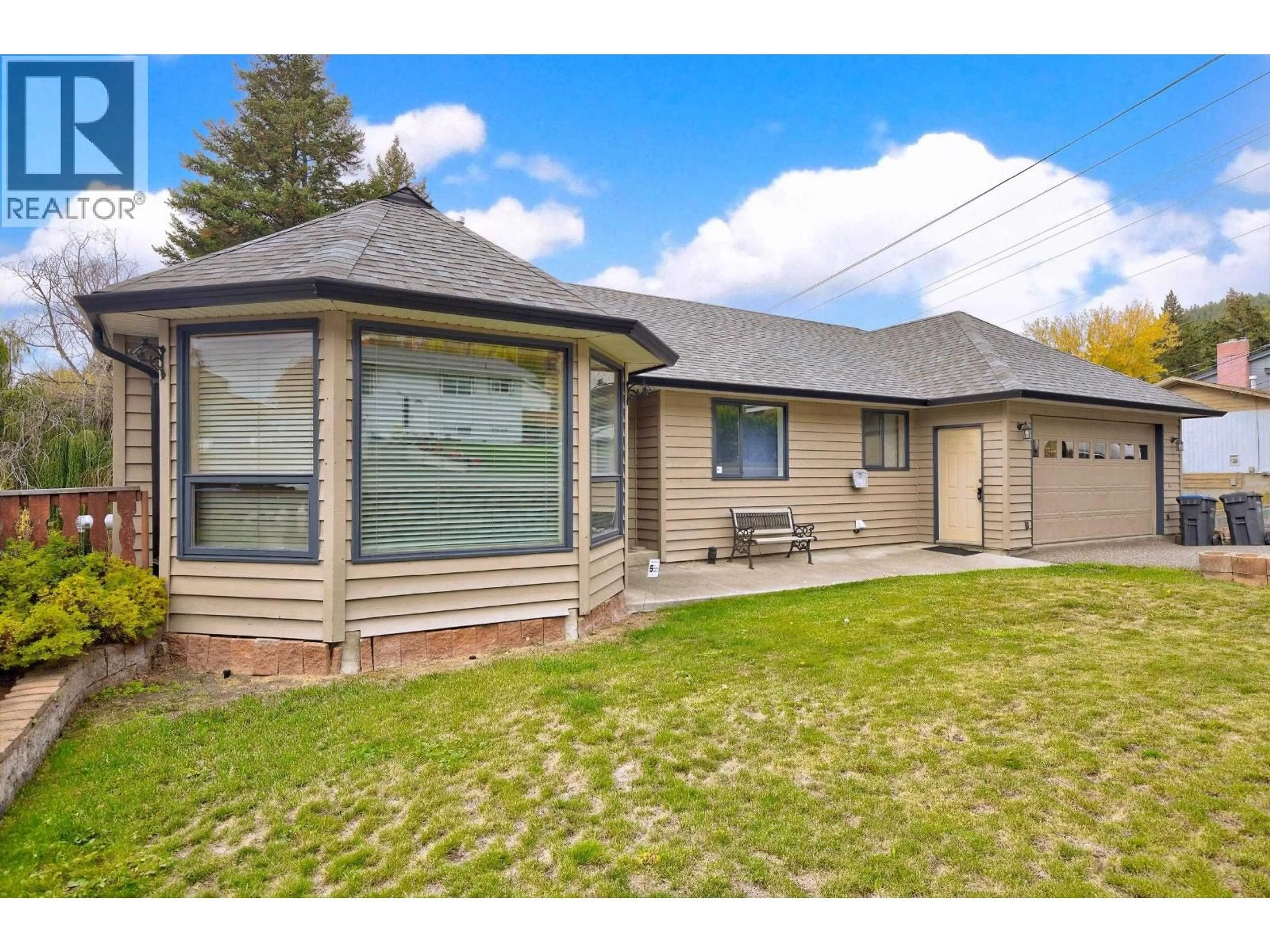 Home with vinyl exterior material, street for 599 PEARKES DRIVE, Williams Lake British Columbia V2G4B1