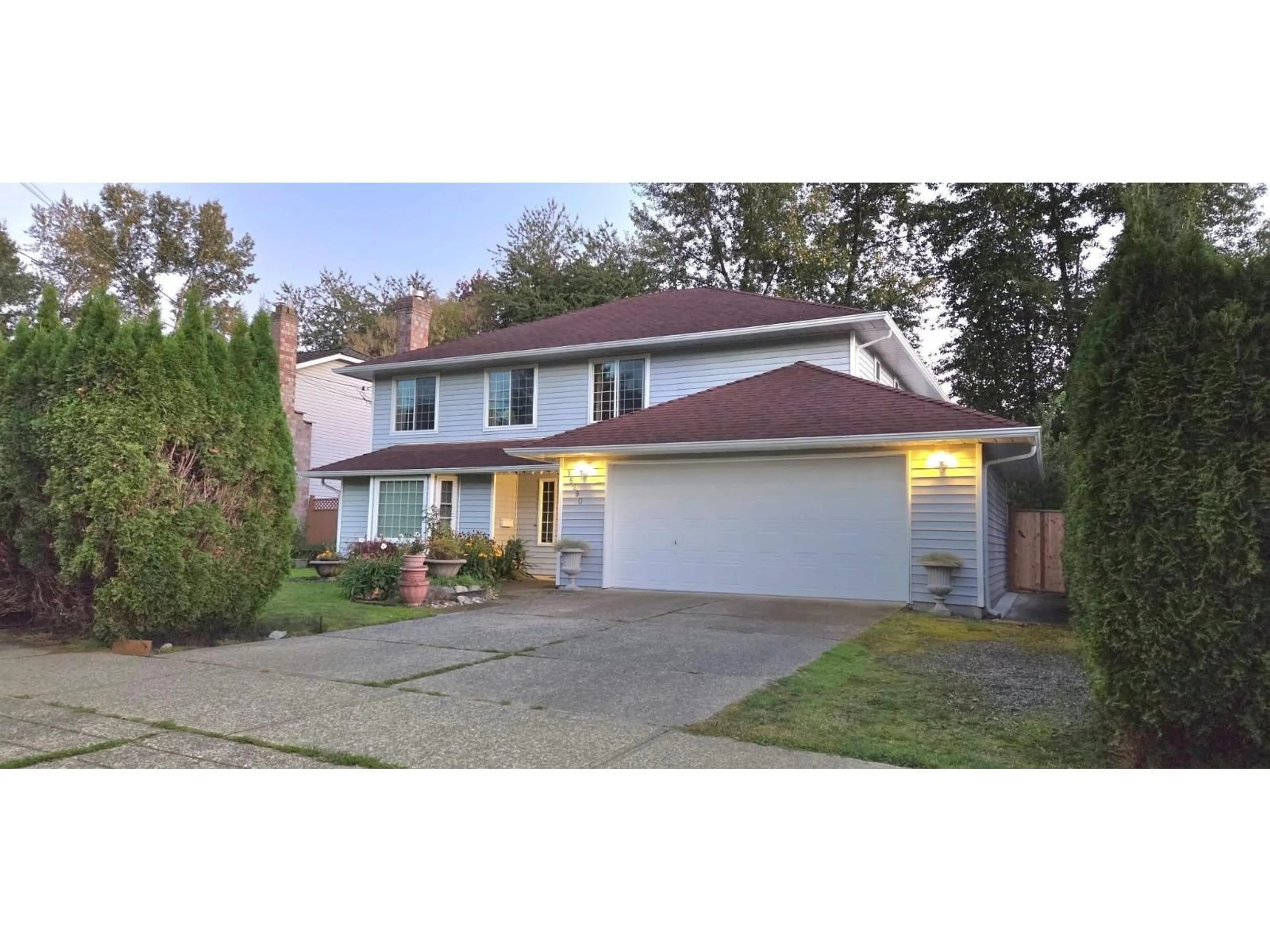 Home with vinyl exterior material, street for 15290 112 AVENUE, Surrey British Columbia V3R8Y8