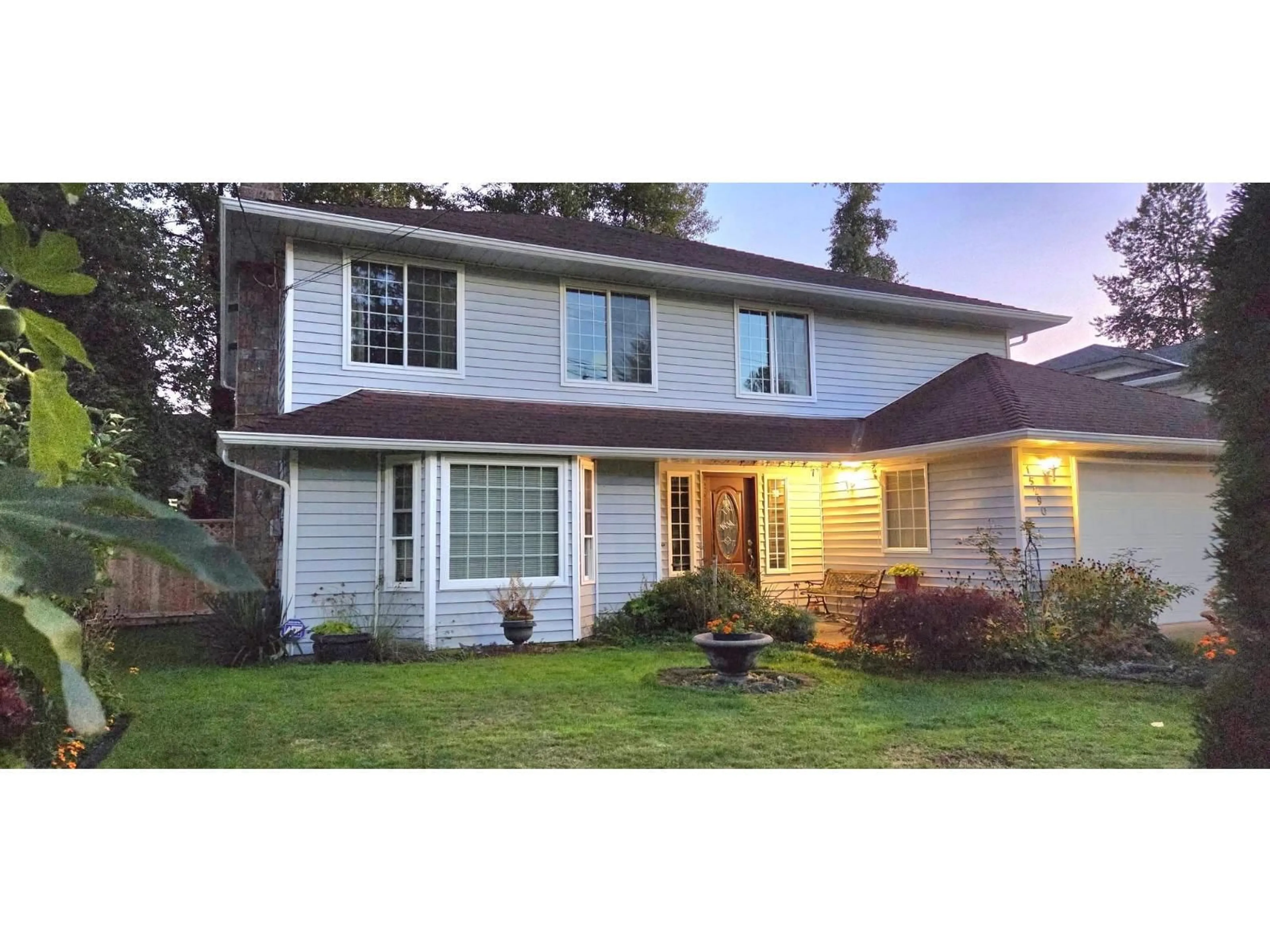 Home with vinyl exterior material, street for 15290 112 AVENUE, Surrey British Columbia V3R8Y8