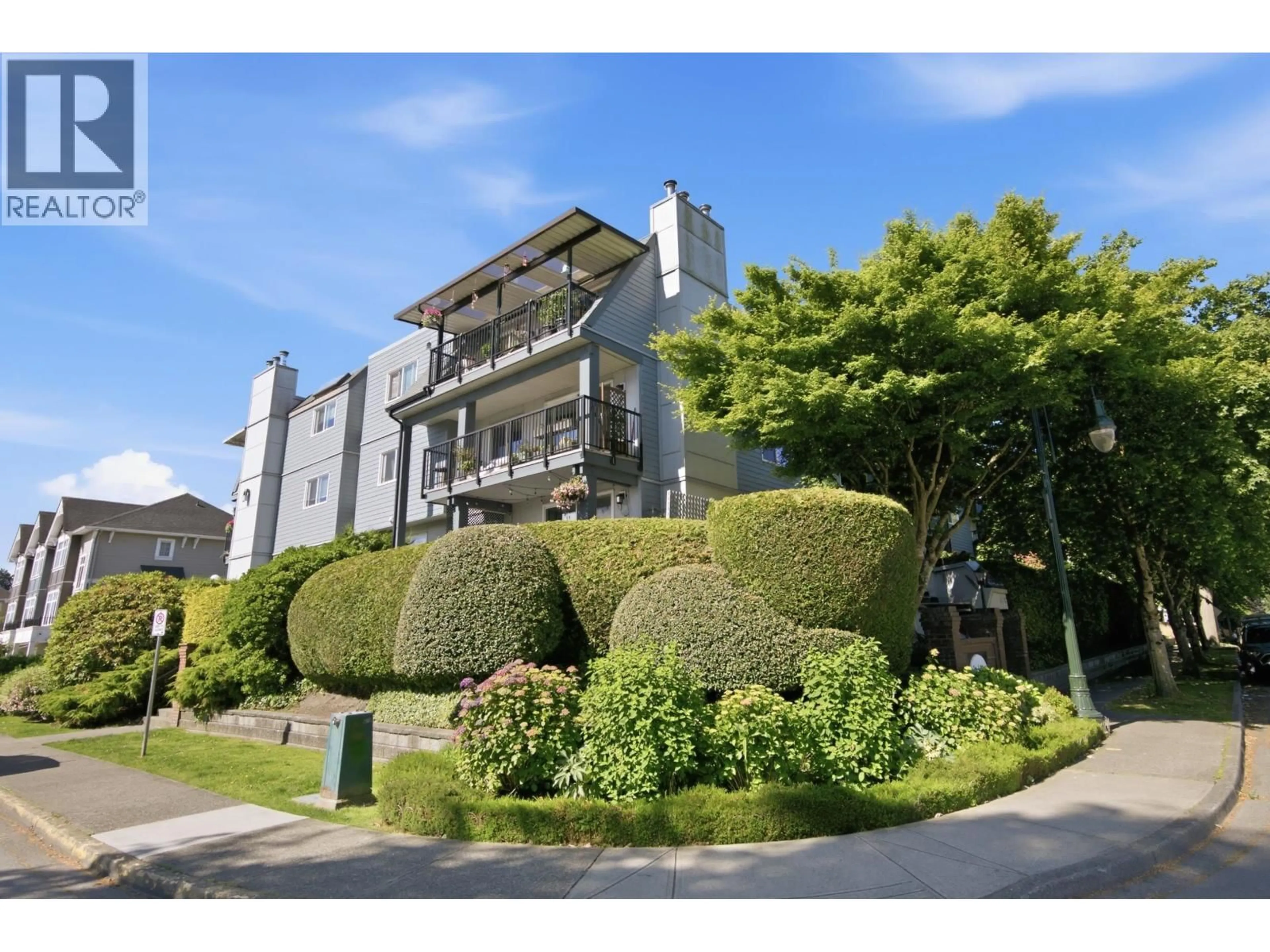 A pic from outside/outdoor area/front of a property/back of a property/a pic from drone, street for 306 - 4926 48 AVENUE, Delta British Columbia V4K1V3