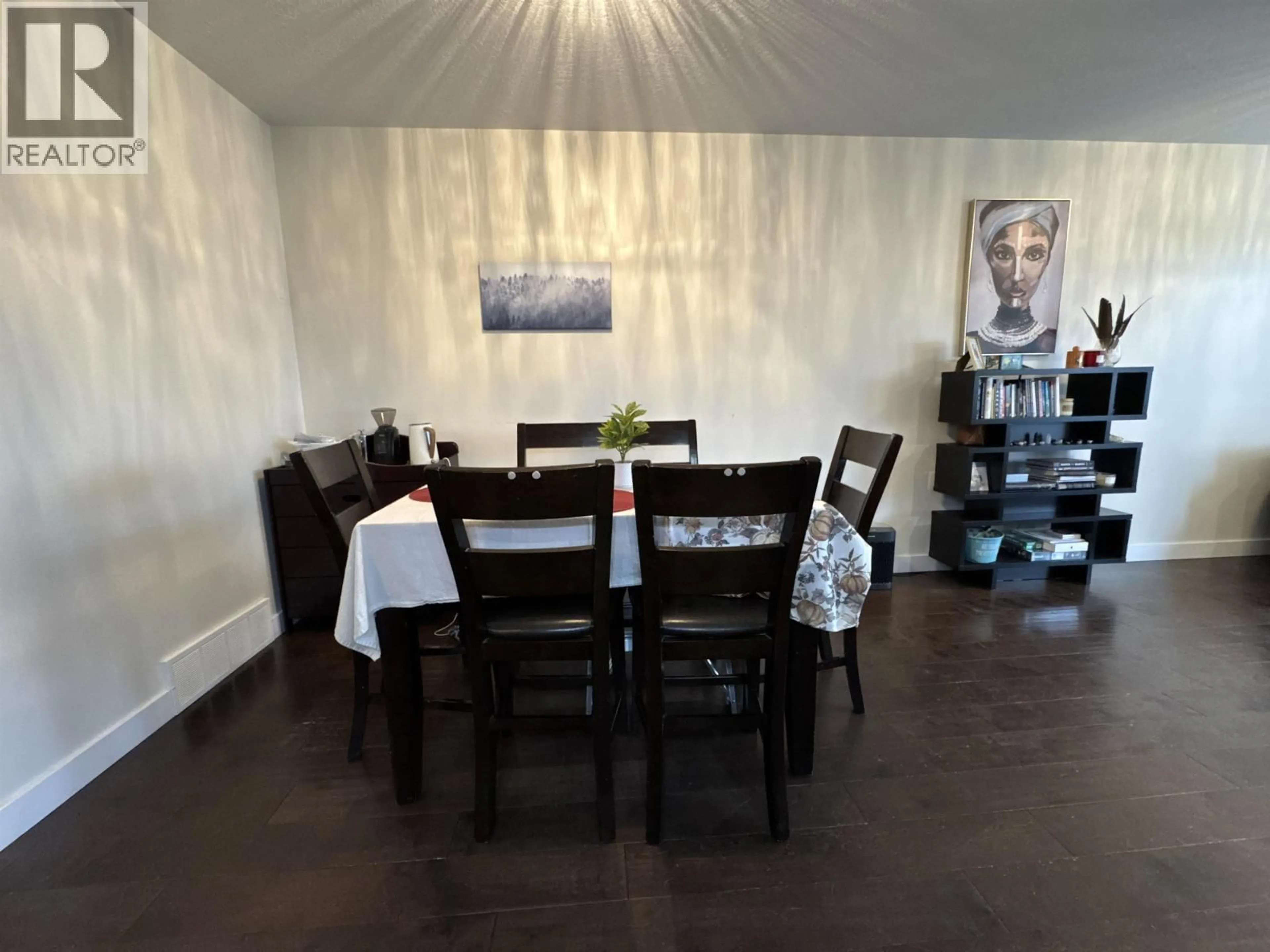 Dining room, wood/laminate floor for 8618 74 STREET, Fort St. John British Columbia V1J7J6