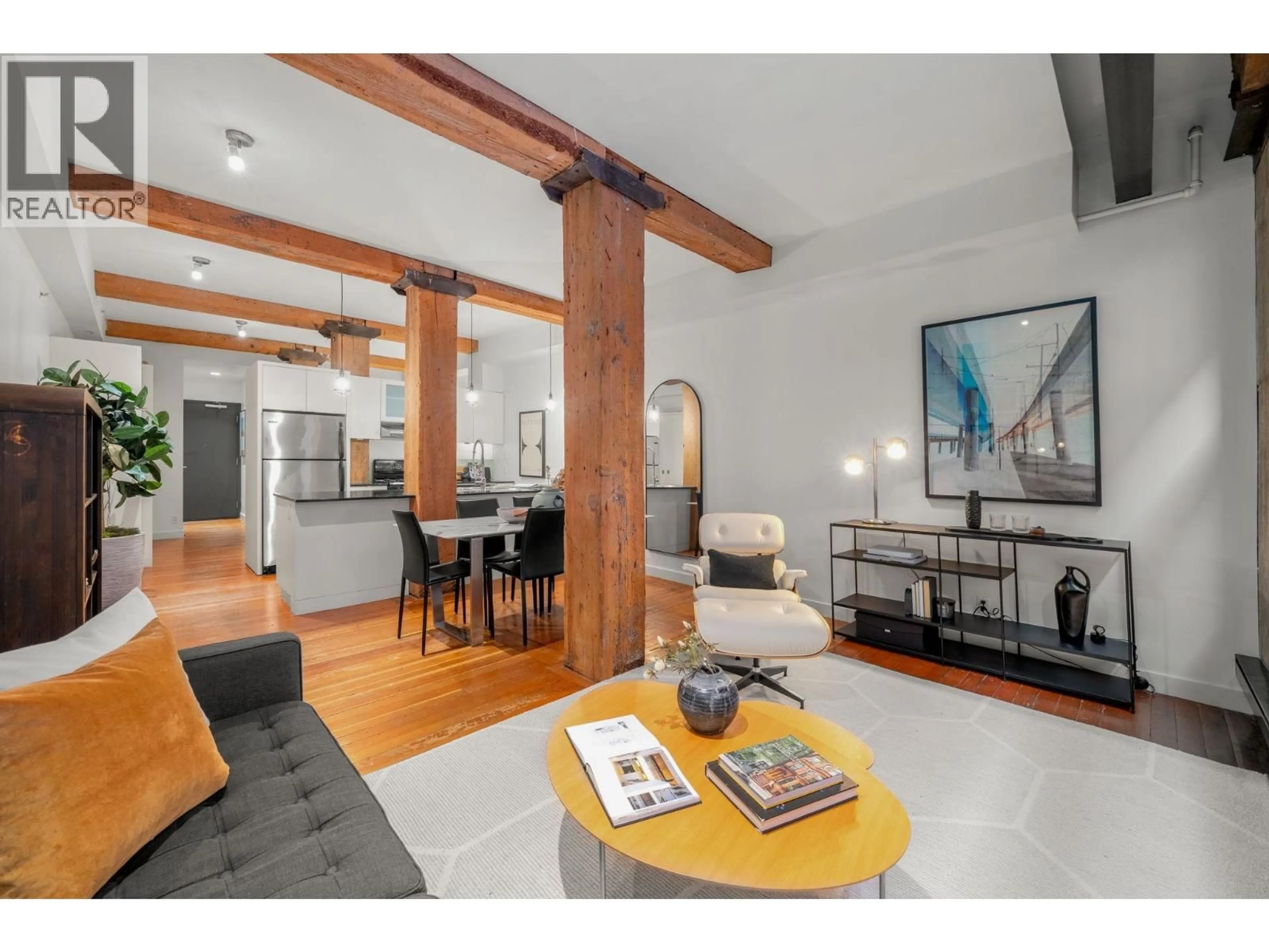 Living room with furniture, wood/laminate floor for 204 - 310 WATER STREET, Vancouver British Columbia V6B1B6