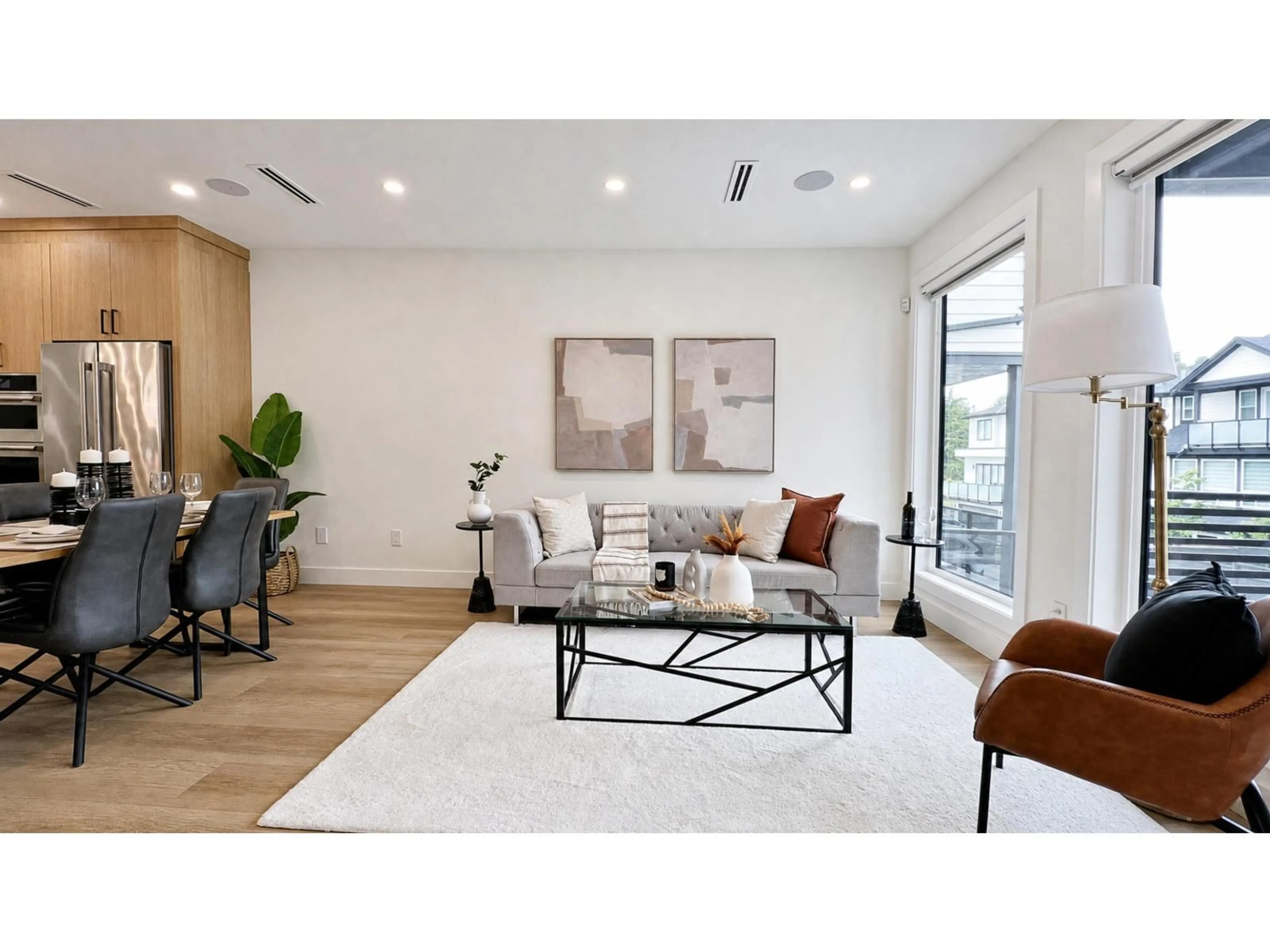 Living room with furniture, wood/laminate floor for 16521 20 AVENUE, Surrey British Columbia V3Z0X6