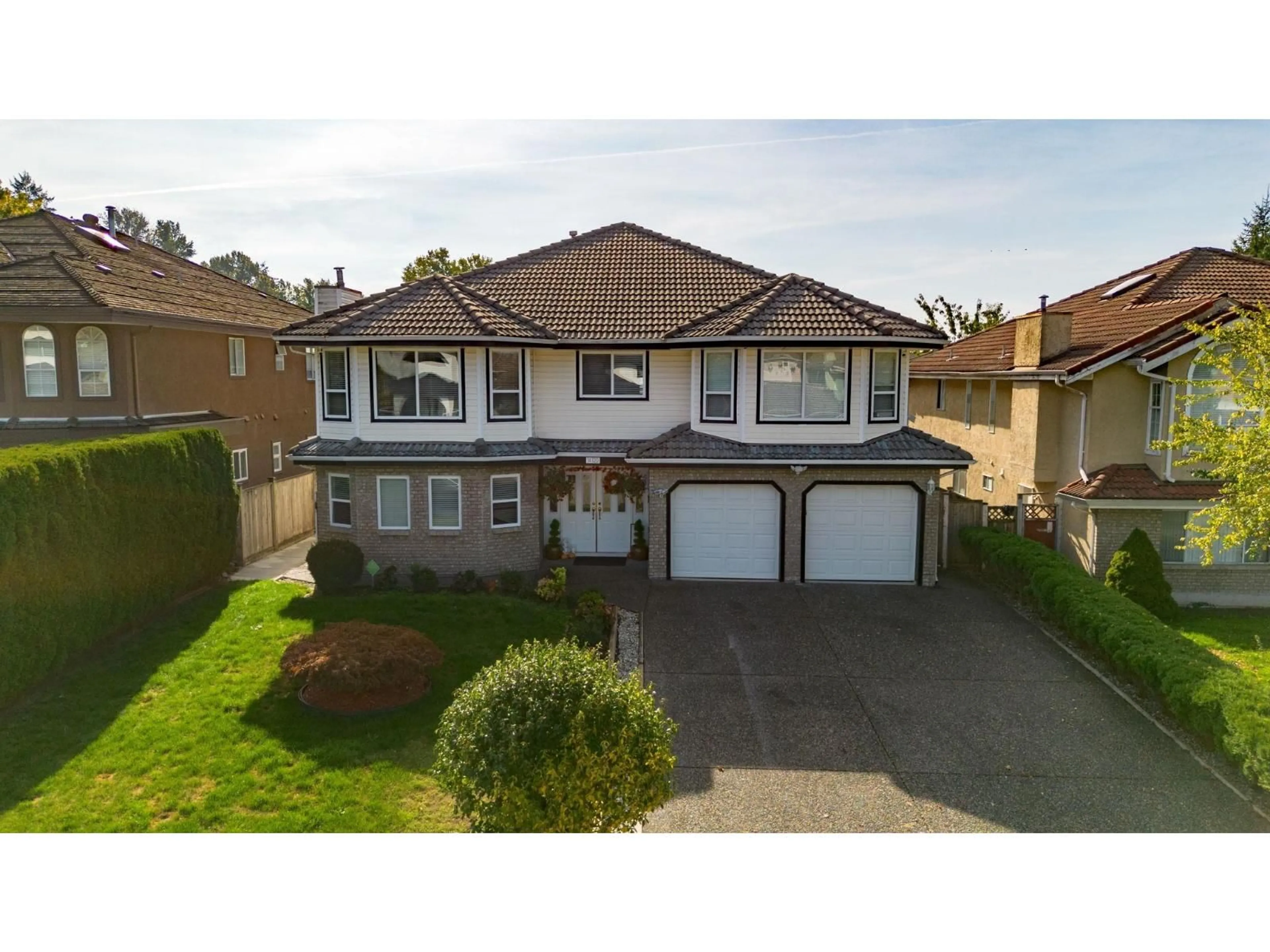 A pic from outside/outdoor area/front of a property/back of a property/a pic from drone, street for 14120 88A AVENUE, Surrey British Columbia V3V7W5