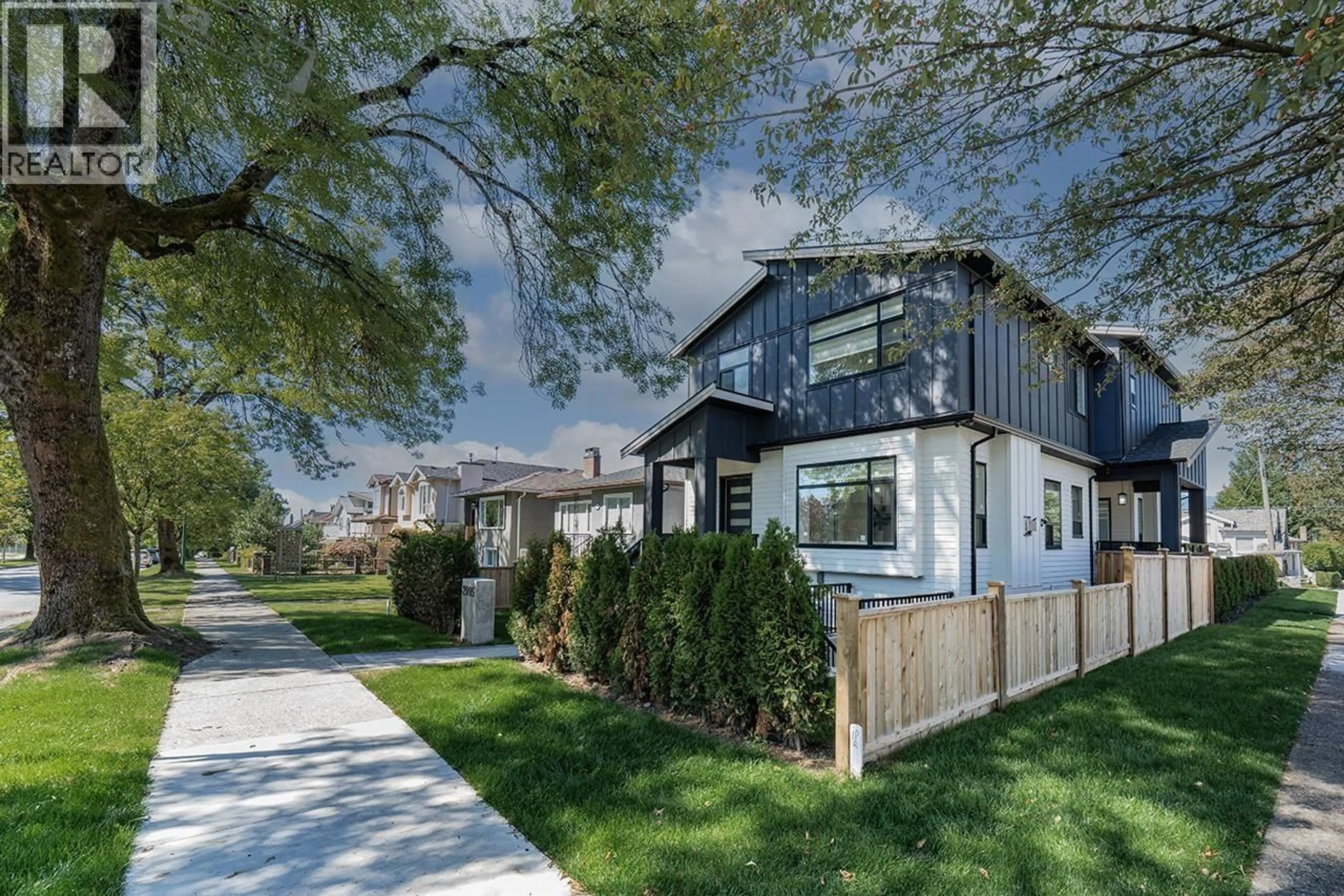 Home with brick exterior material, street for 2995 17TH AVENUE, Vancouver British Columbia V5M2N4