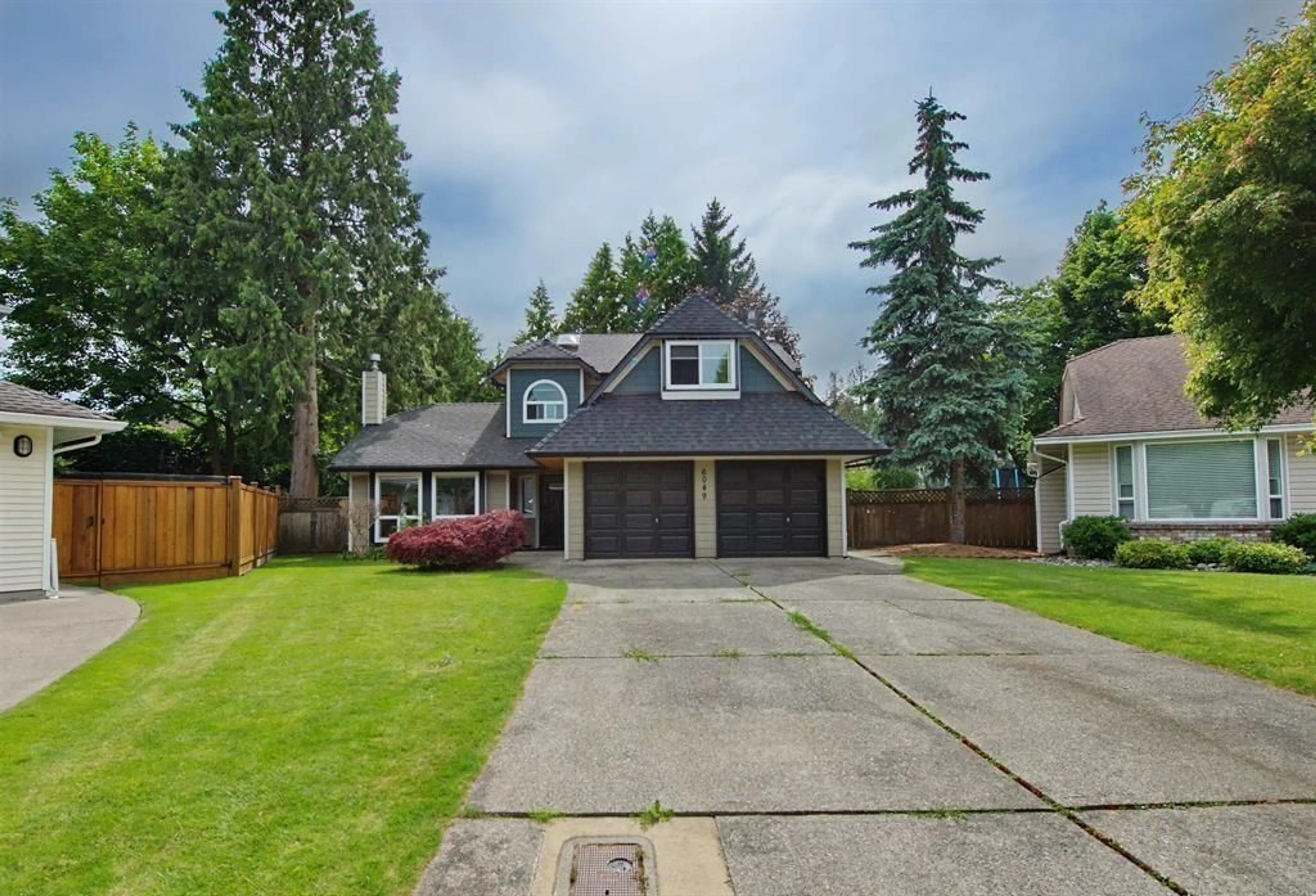 Home with vinyl exterior material, street for 6049 133A STREET, Surrey British Columbia V3X2K3