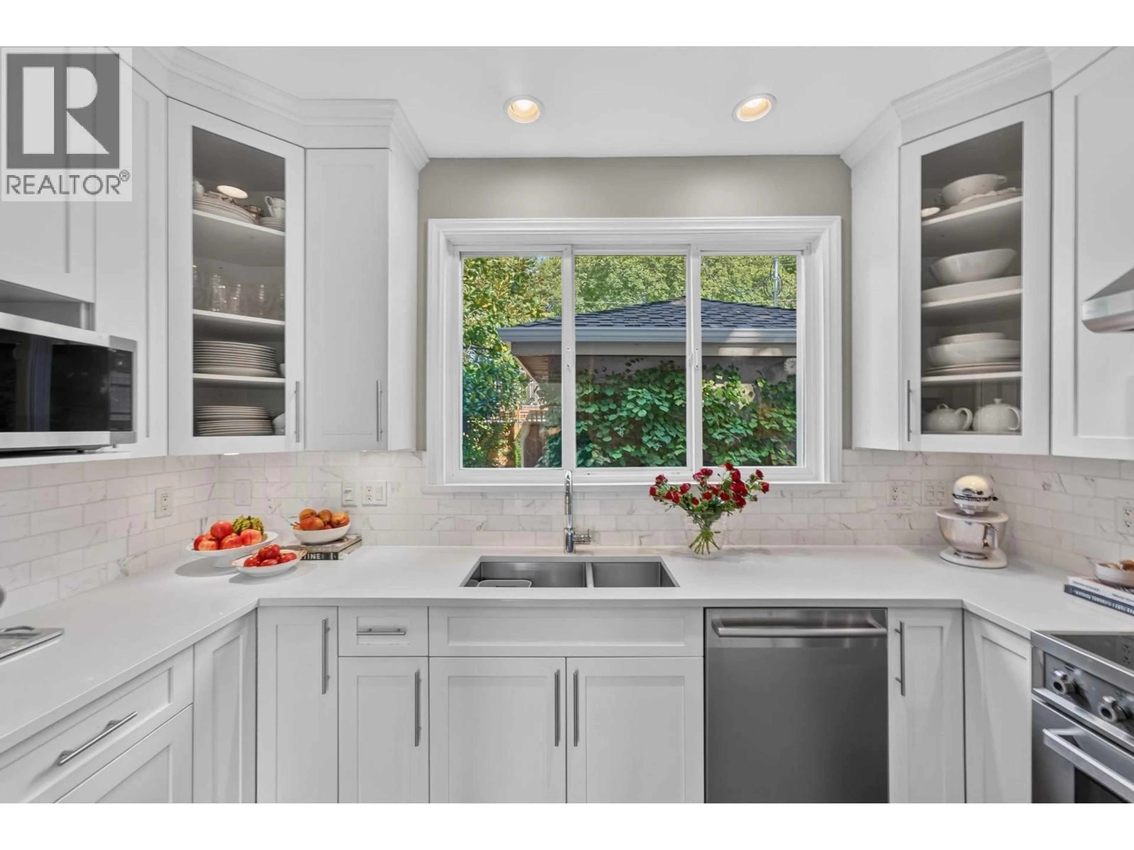 Contemporary kitchen, ceramic/tile floor for 135 43RD AVENUE, Vancouver British Columbia V5W1T1