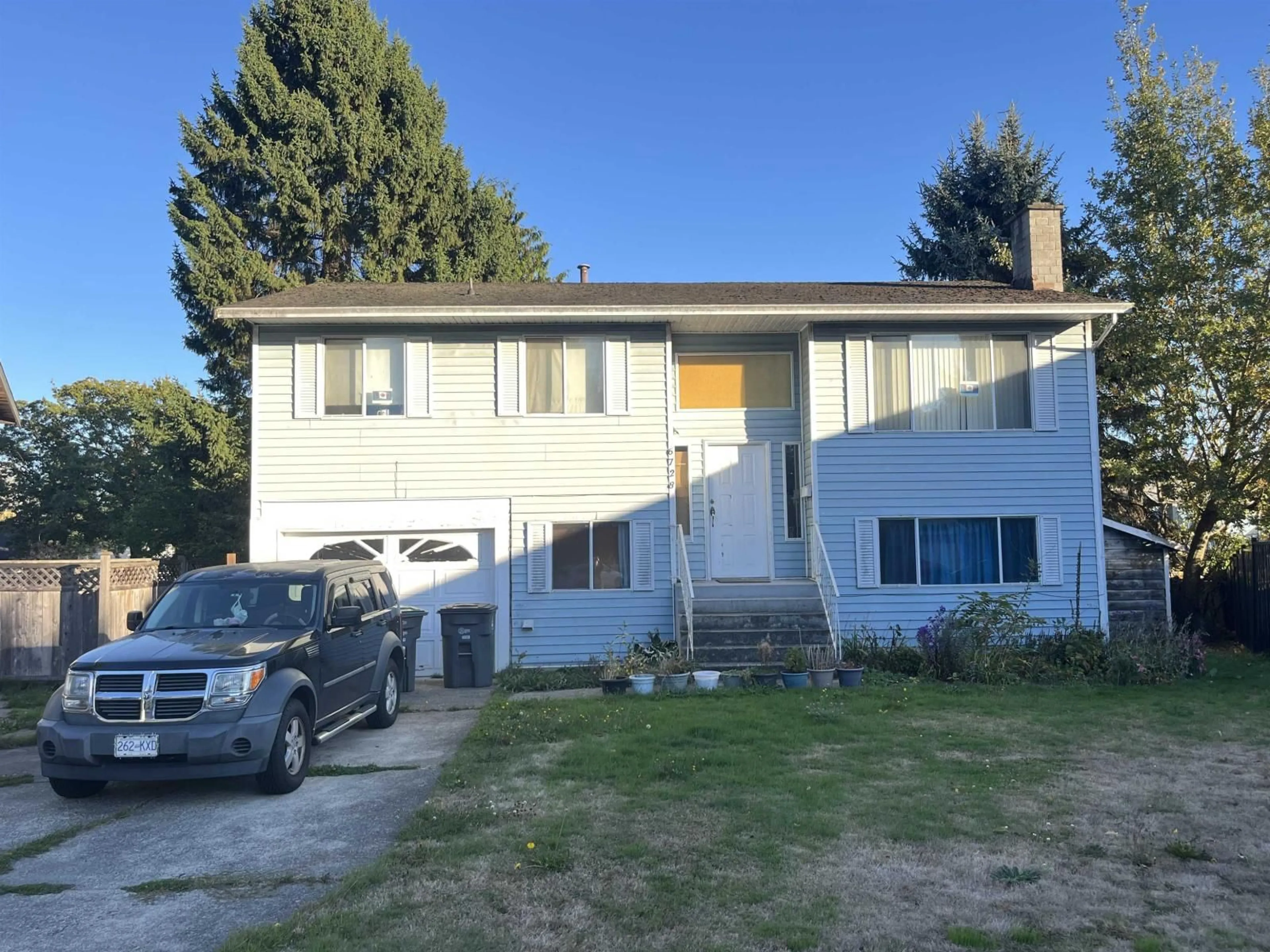 Home with vinyl exterior material, street for 6728 134A STREET, Surrey British Columbia V3W4V3