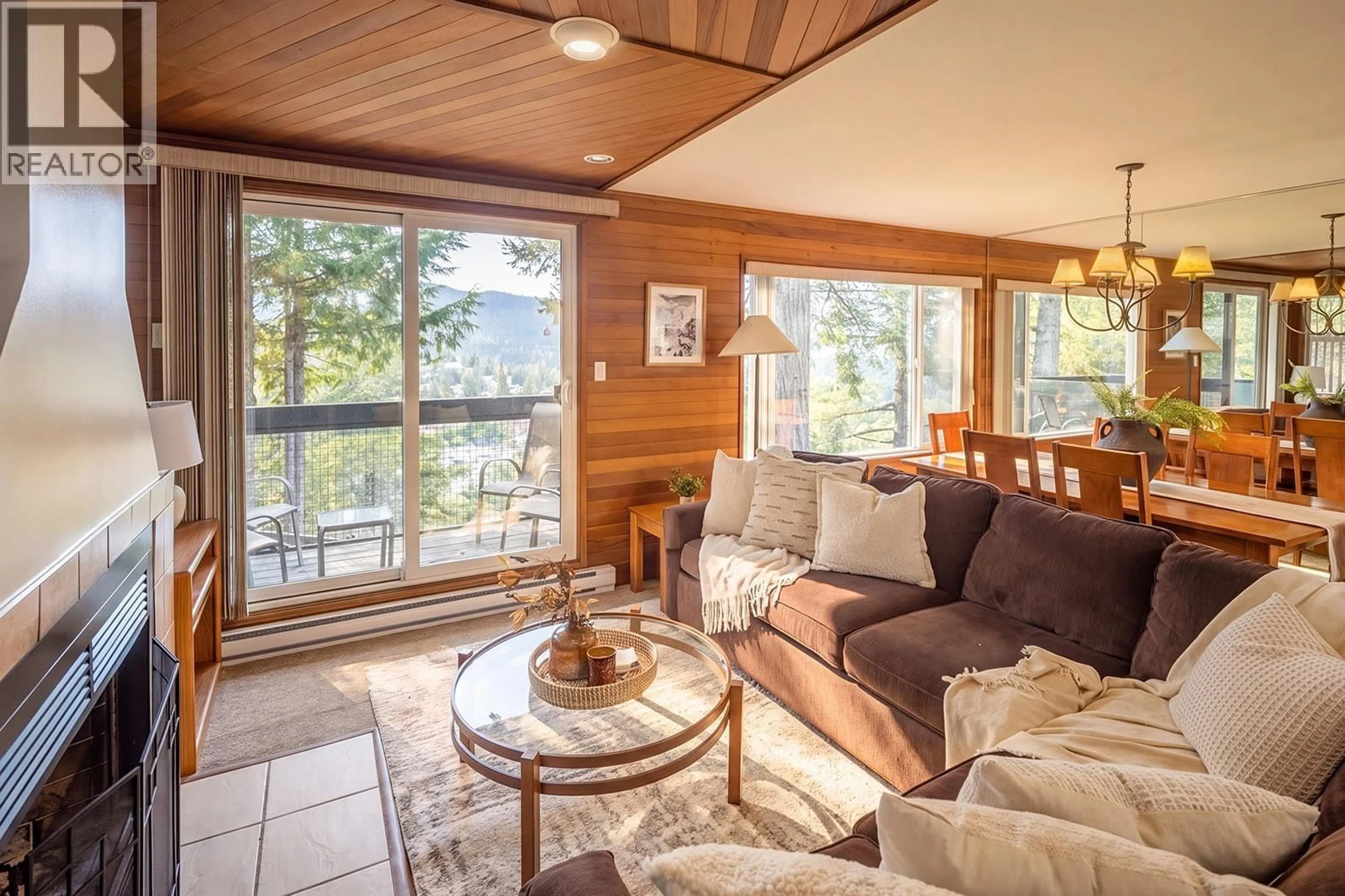 Living room with furniture, wood/laminate floor for 15 - 2400 CAVENDISH WAY, Whistler British Columbia V8E0L8