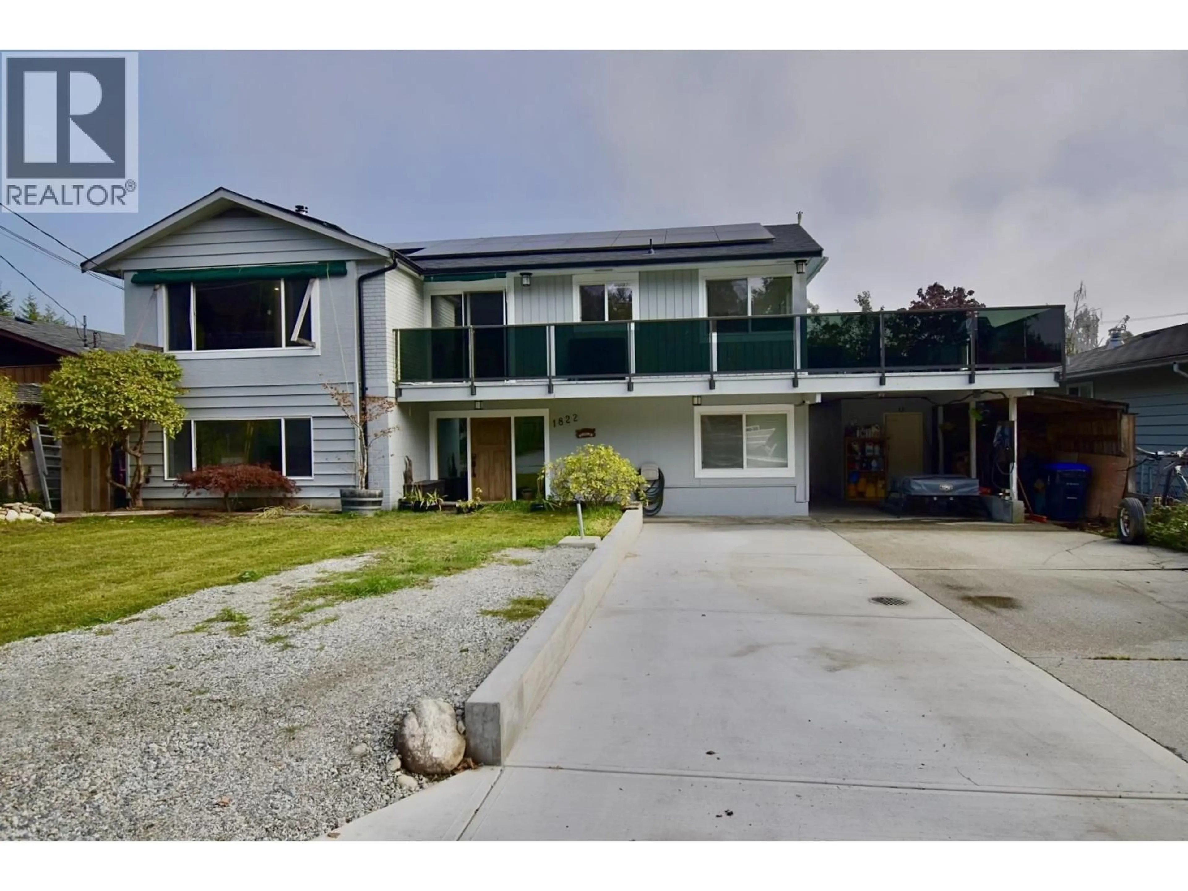 A pic from outside/outdoor area/front of a property/back of a property/a pic from drone, street for 1822 HALL ROAD, Sechelt British Columbia V7Z0A9