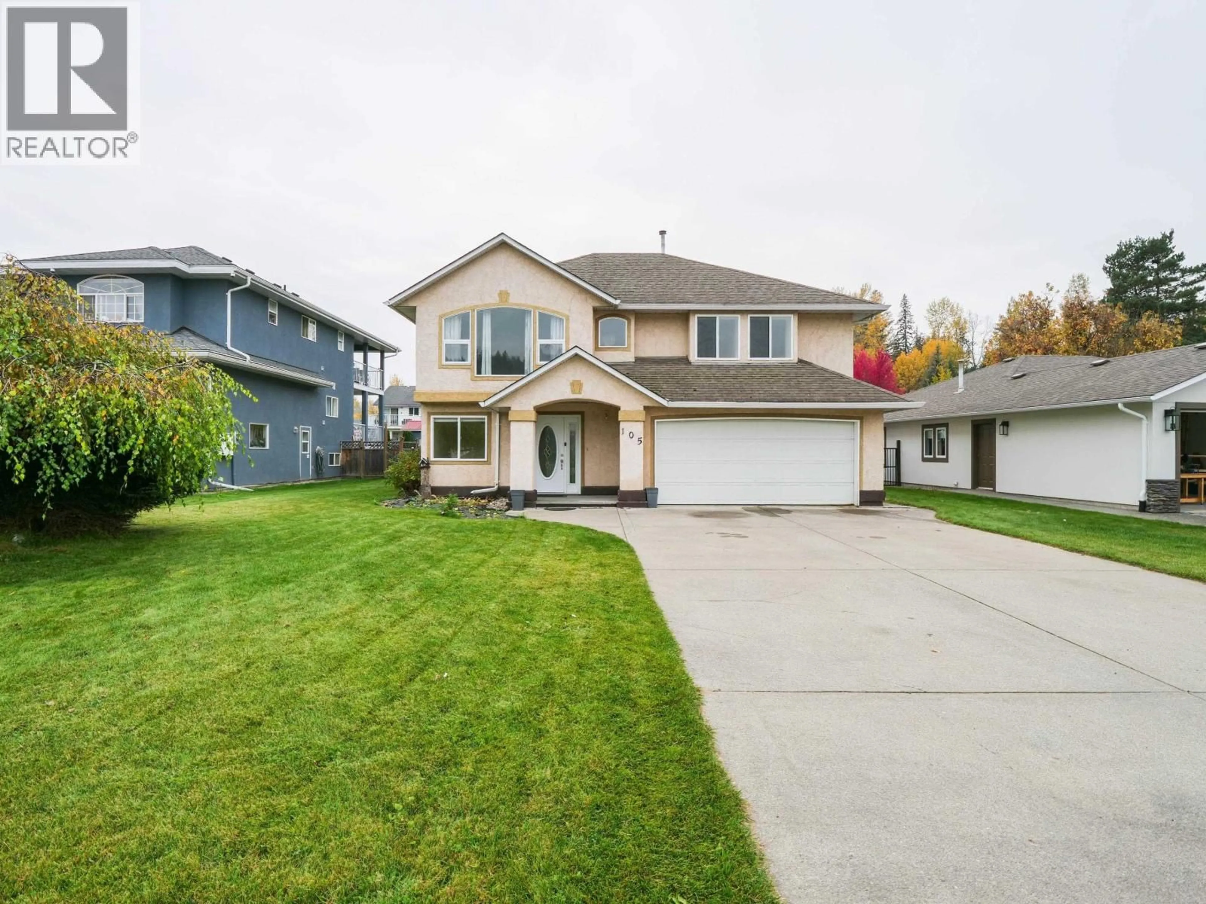 Home with vinyl exterior material, street for 105 LOWE STREET, Quesnel British Columbia V2J5T4