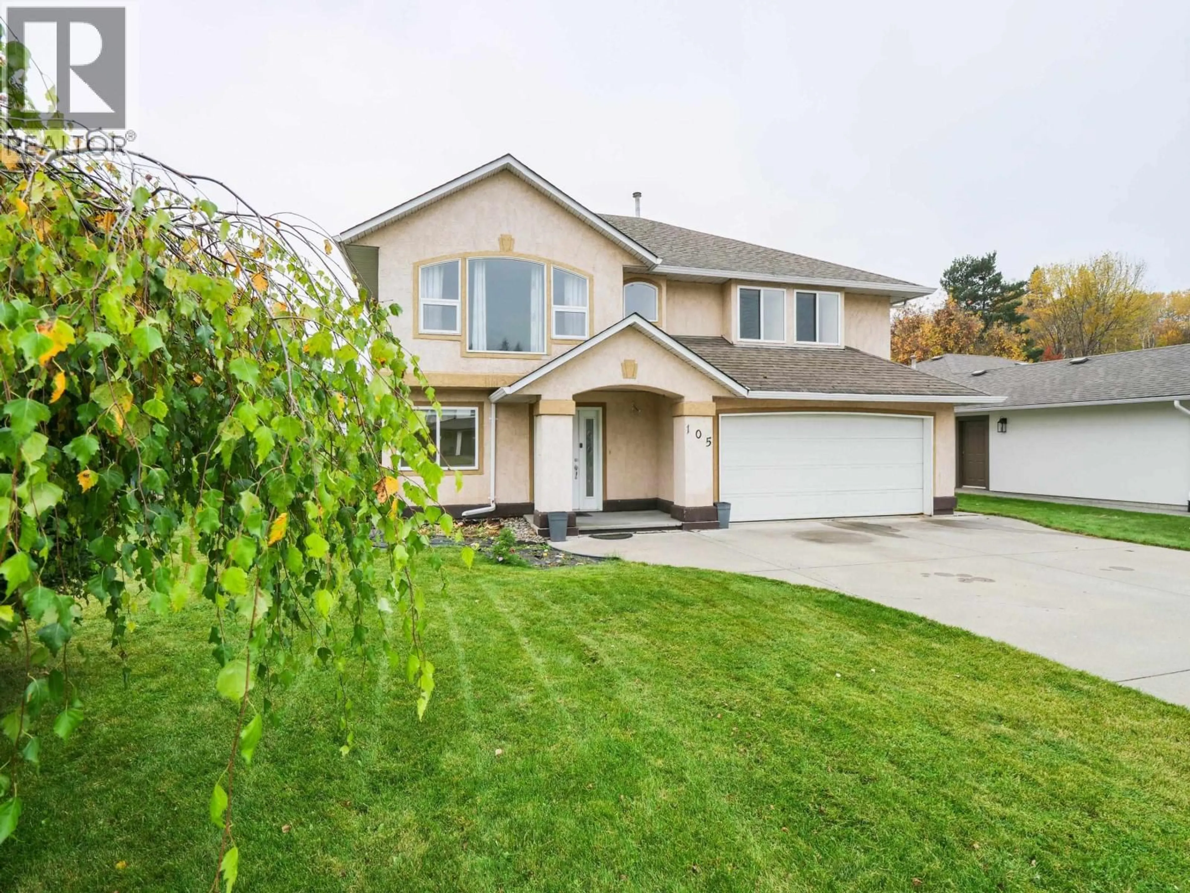 Home with vinyl exterior material, street for 105 LOWE STREET, Quesnel British Columbia V2J5T4