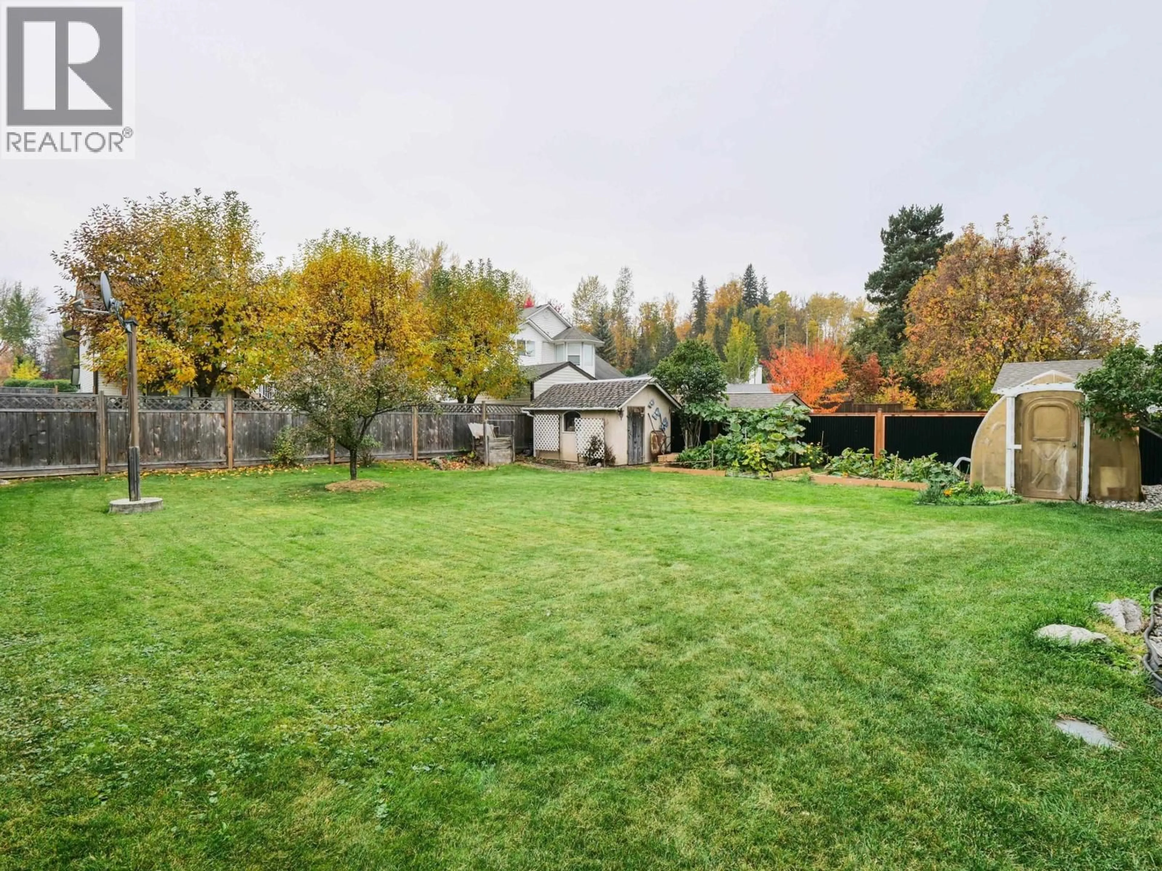 A pic from outside/outdoor area/front of a property/back of a property/a pic from drone, forest/trees view for 105 LOWE STREET, Quesnel British Columbia V2J5T4