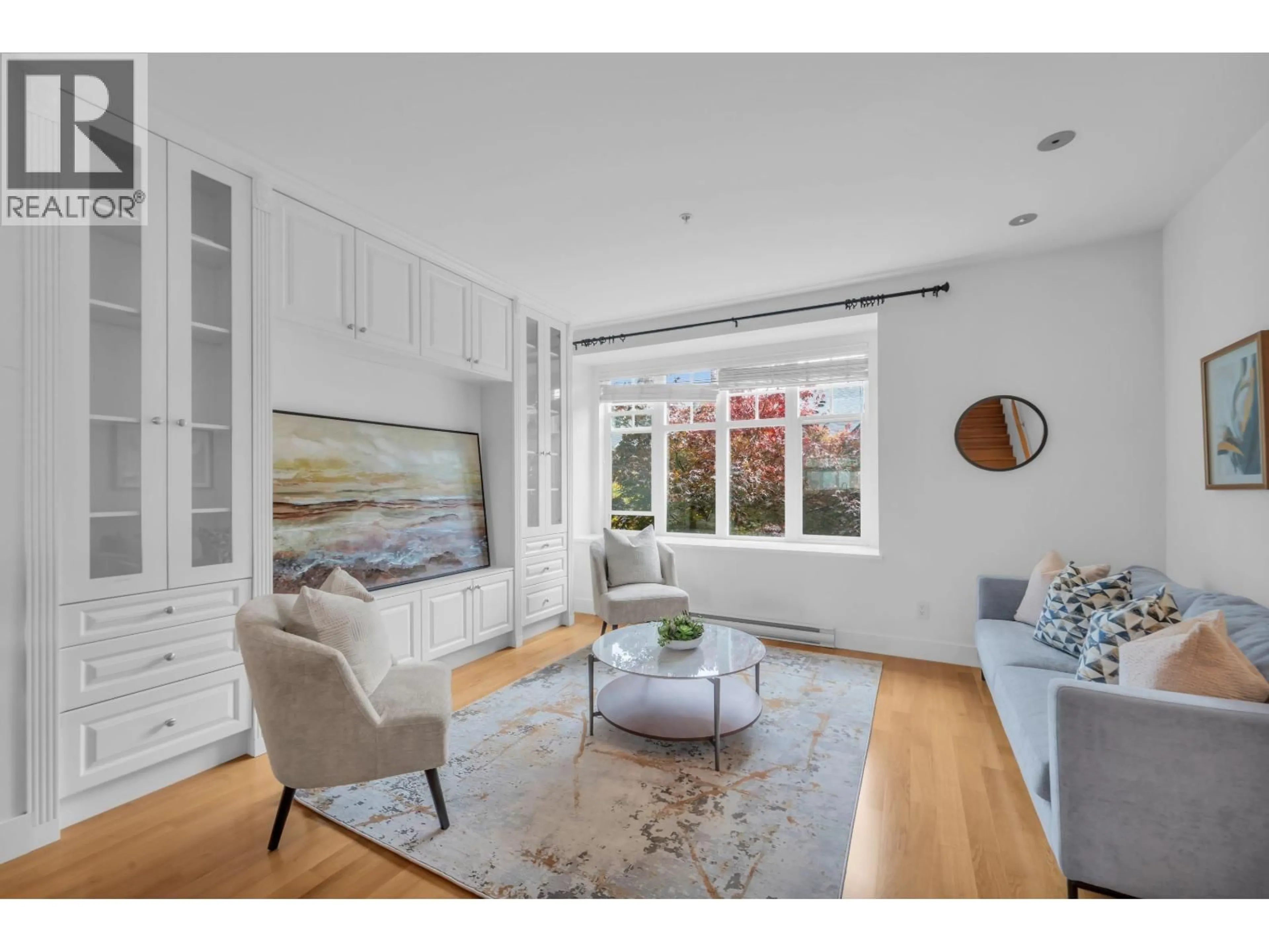 Living room with furniture, wood/laminate floor for 5603 WILLOW STREET, Vancouver British Columbia V5Z3S3