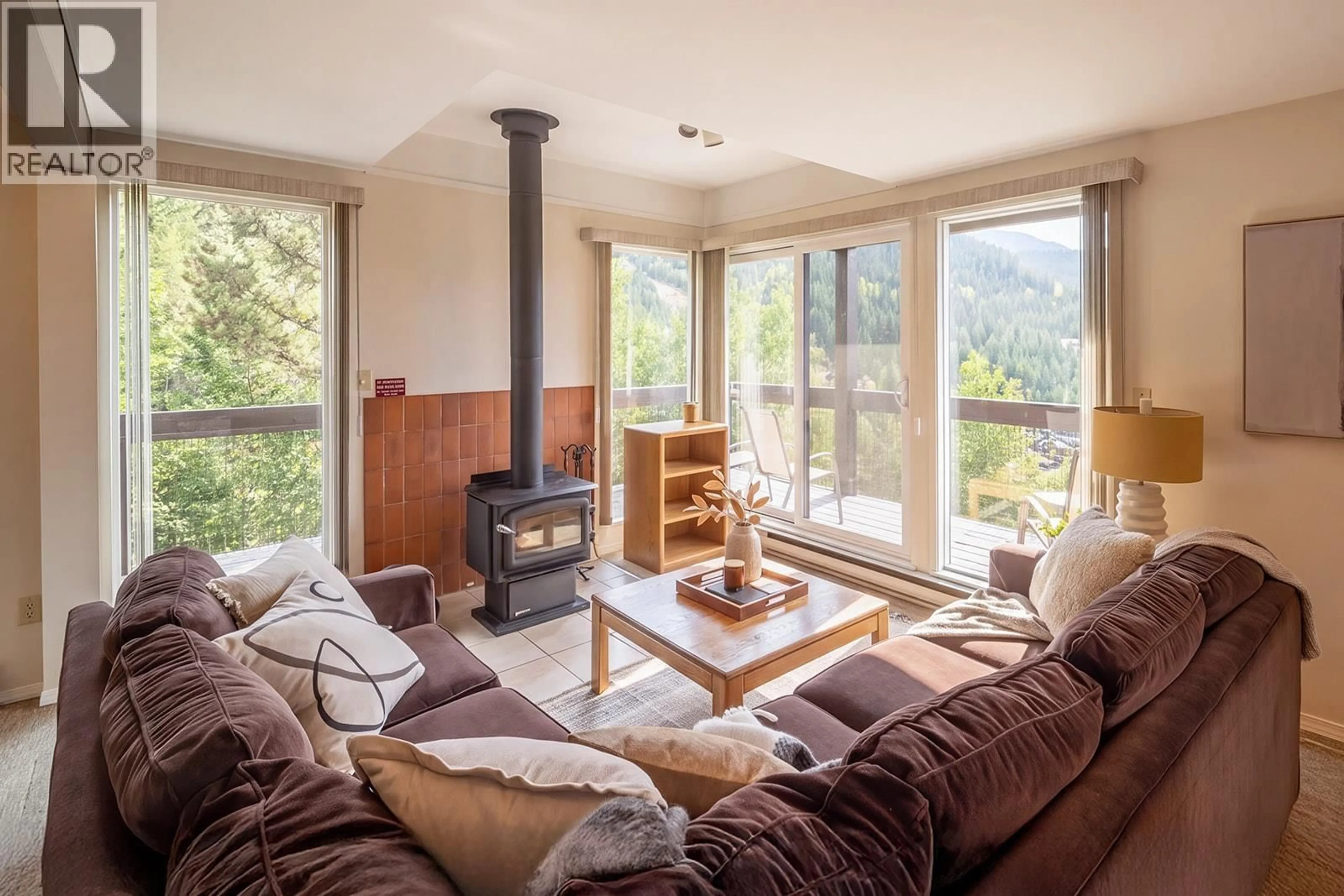 Living room with furniture, wood/laminate floor for 59 - 2400 CAVENDISH WAY, Whistler British Columbia V8E0L8