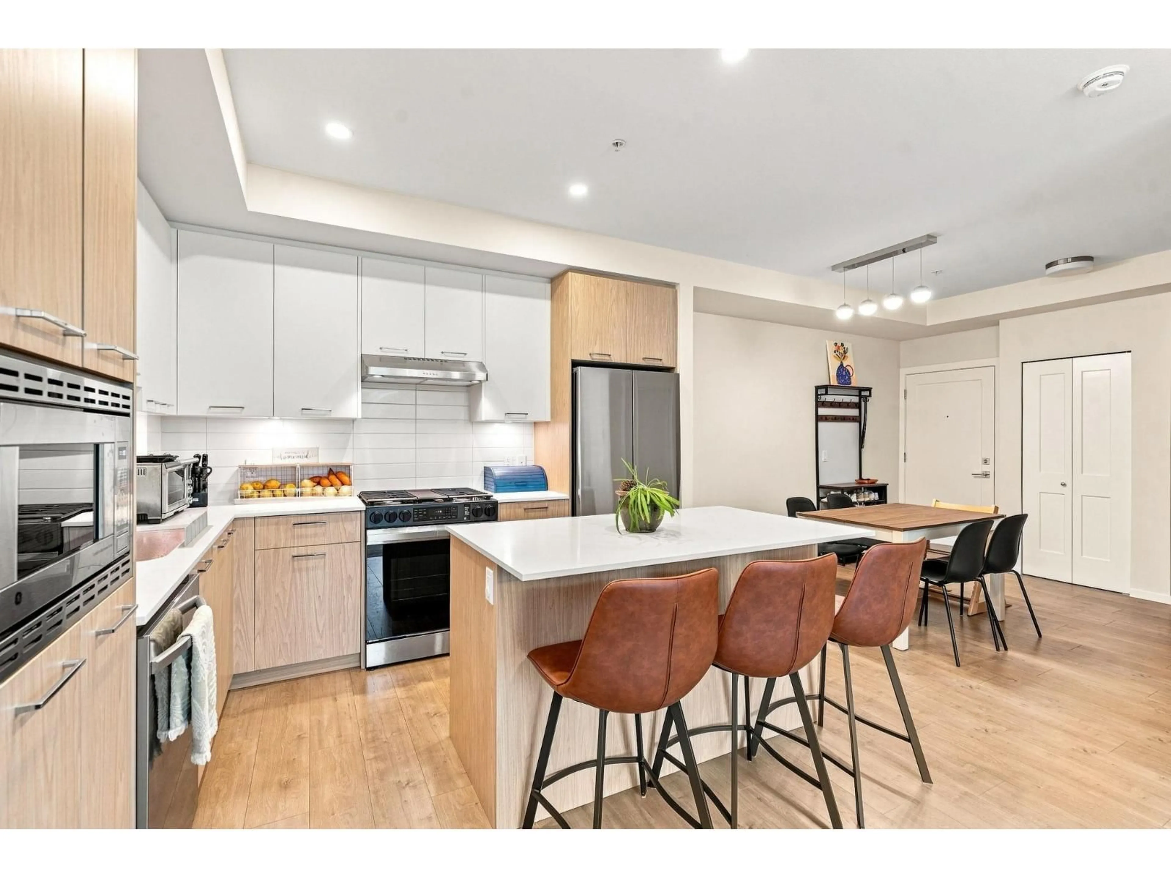 Open concept kitchen, unknown for 210 - 3319 148 STREET, Surrey British Columbia V4P0J2
