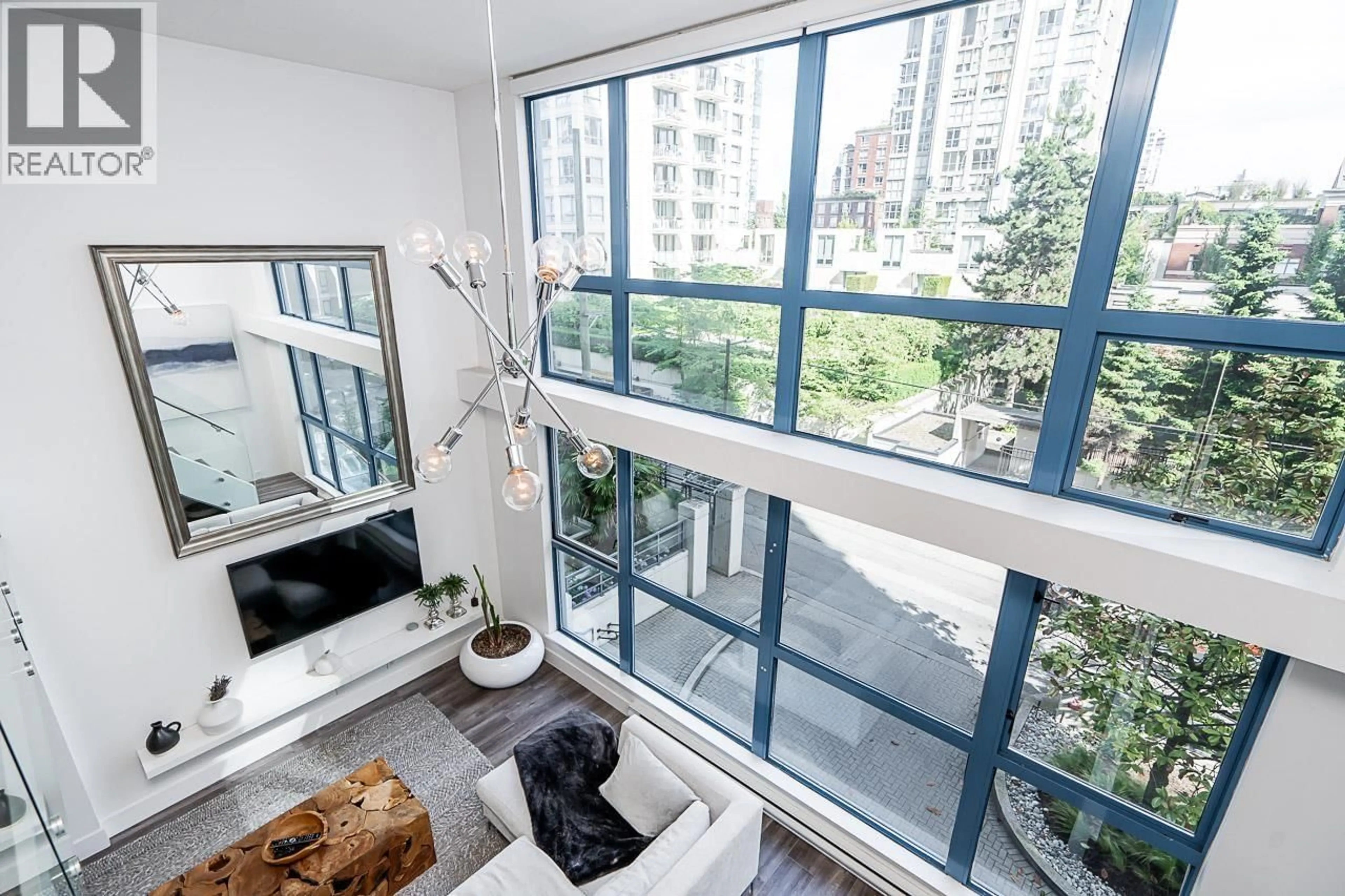Balcony in the apartment, city buildings view from balcony for 212 - 1238 SEYMOUR STREET, Vancouver British Columbia V6B6J3